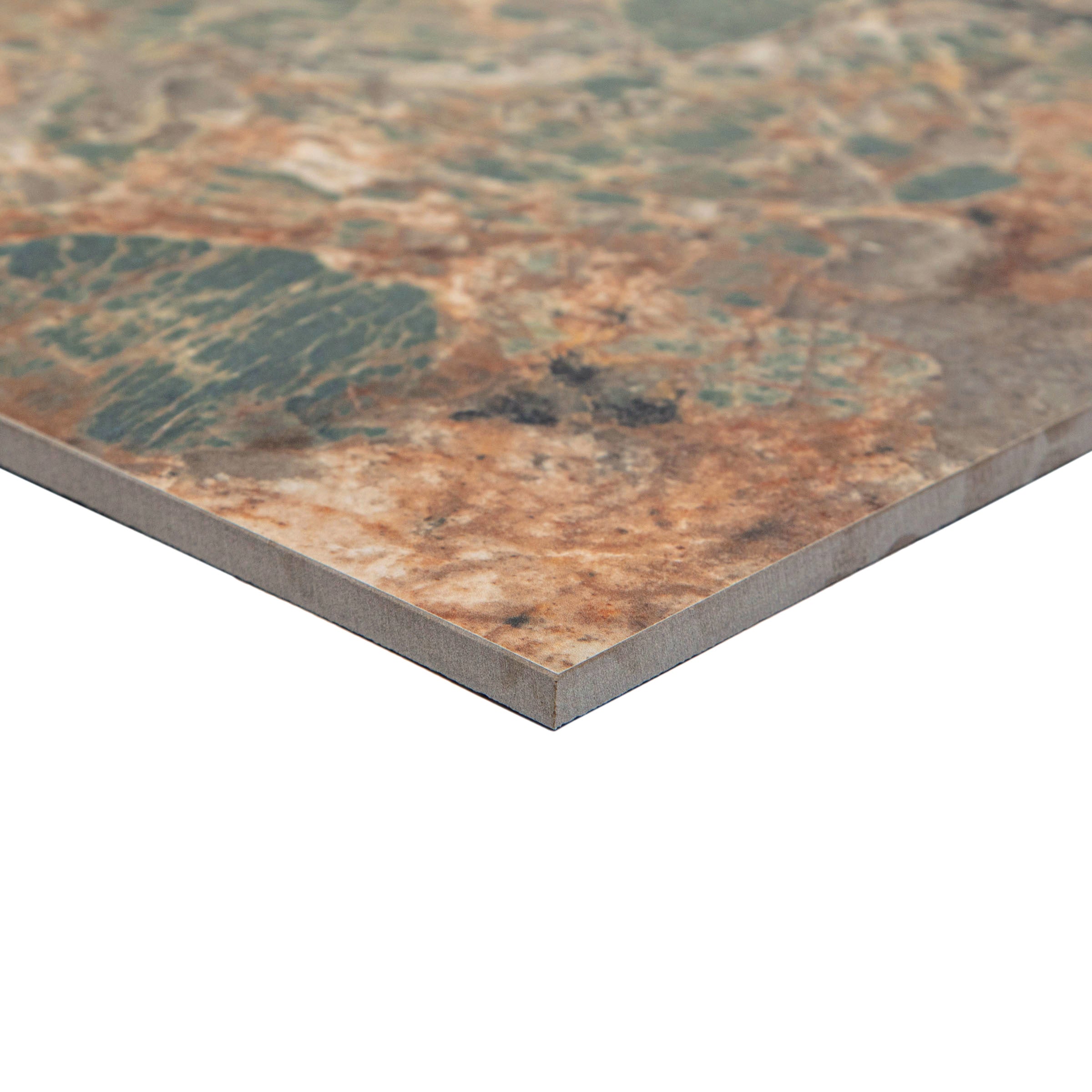 Close-up of a large format tile with a natural stone pattern featuring earthy browns and green veining details