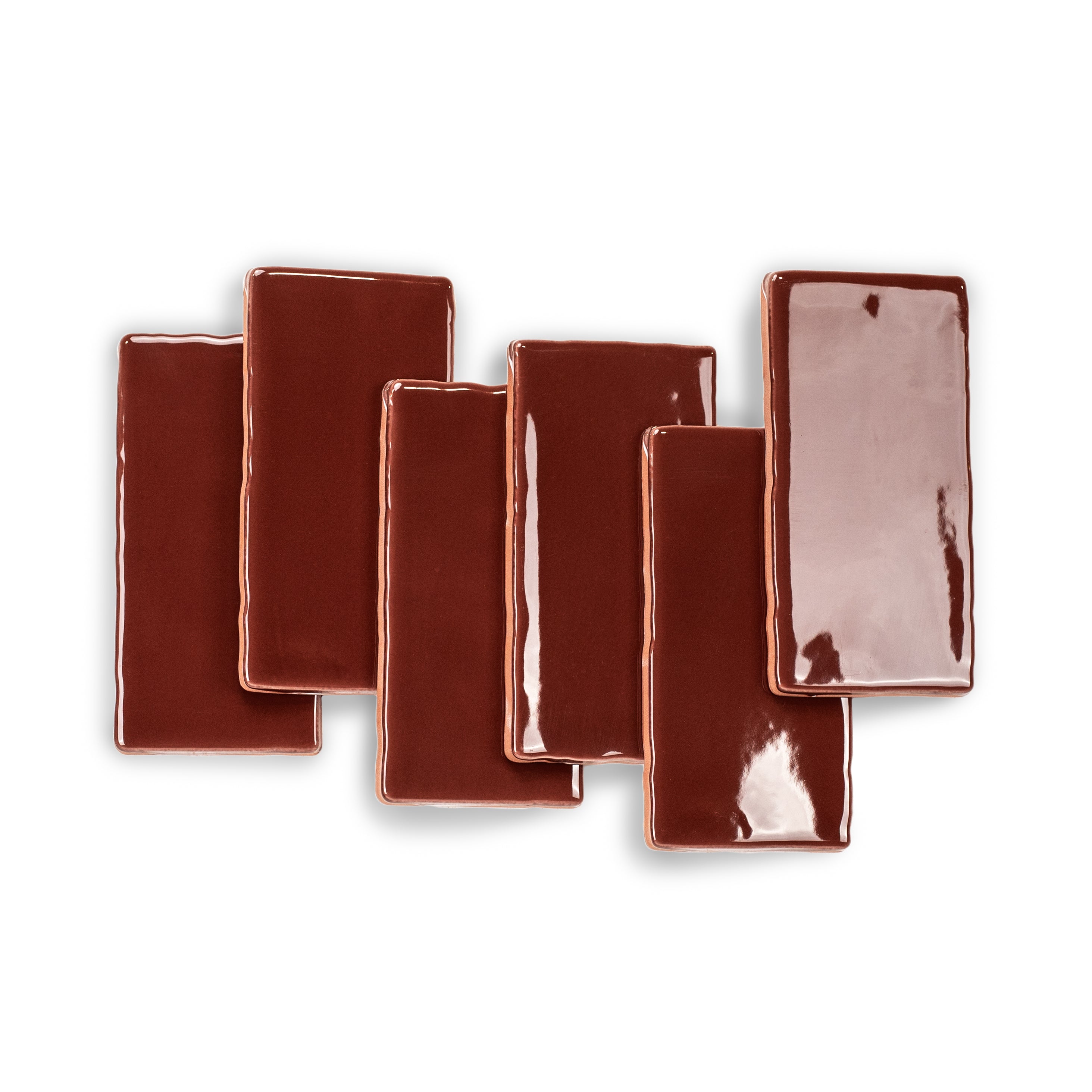 Crimson 3x6 Glossy Ceramic Tile in rich red with a lacquer-like gloss and gently undulating surface from Seville Small Format Tiles collection