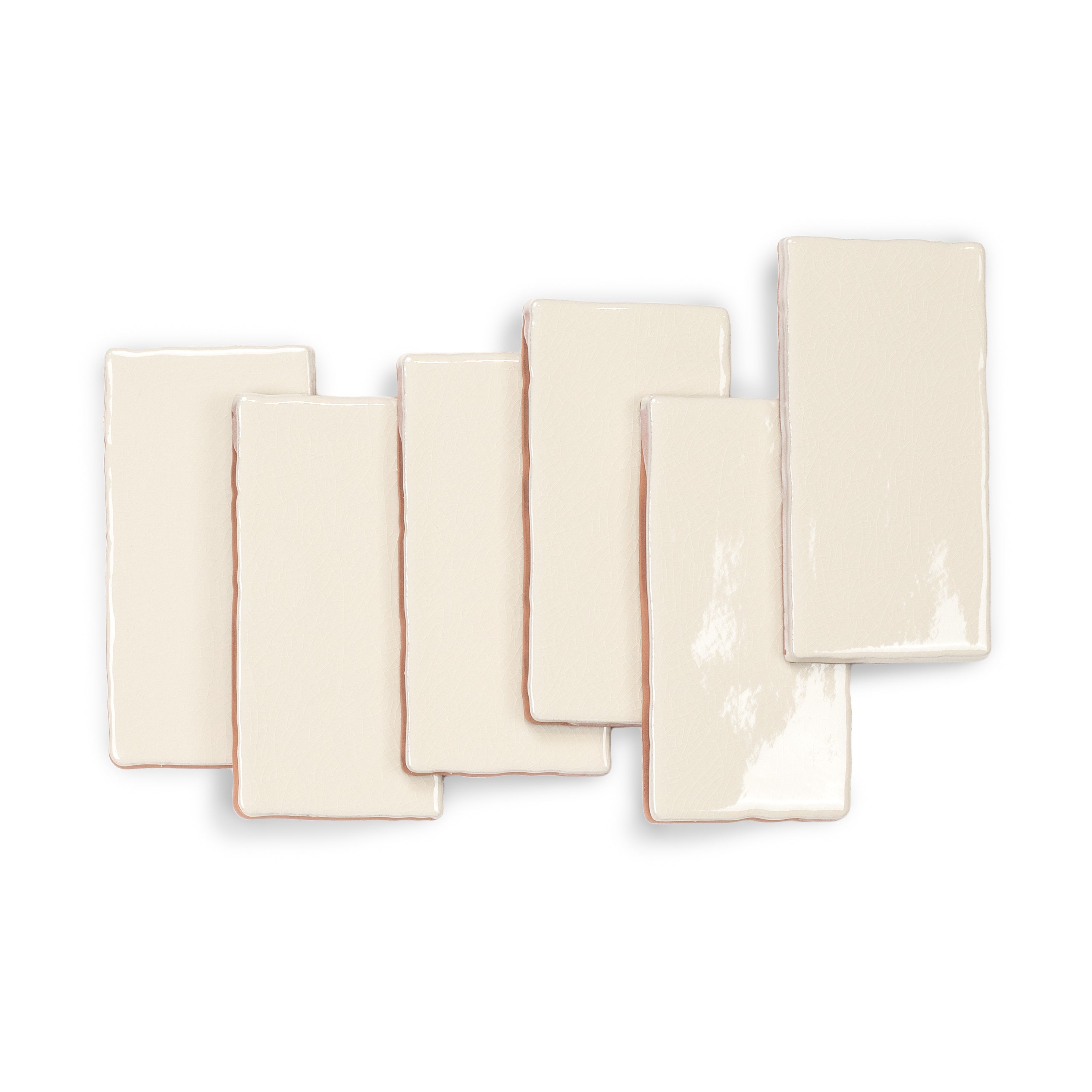 Dark White 3x6 Glossy Ceramic Tile in warm beige and white tones with a subtle undulating surface from Seville Small Format Tiles