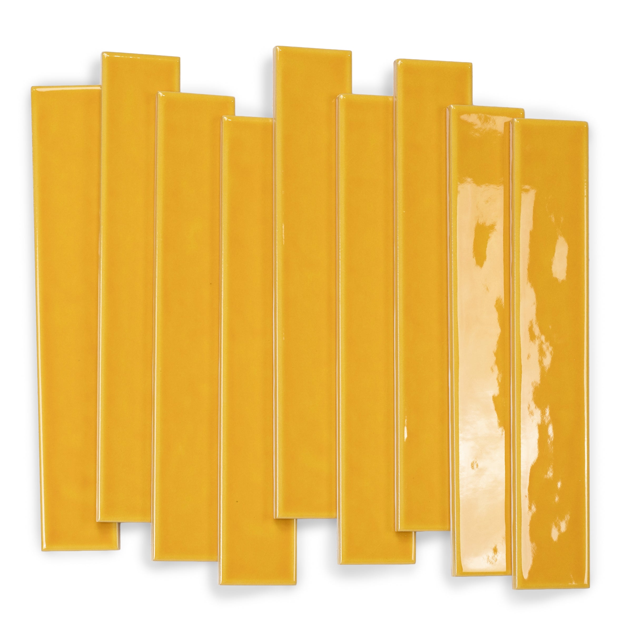 Glossy amber ceramic tiles with smooth reflective surfaces arranged in a staggered overlapping layout on white background