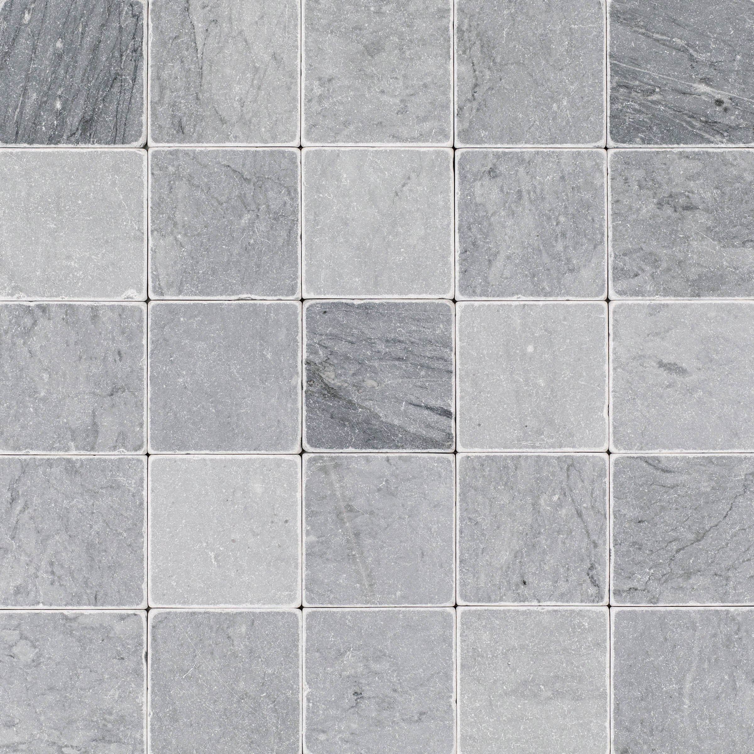 Bardiglio 4x4 Tumbled Marble Tile in medium gray with subtle white veining from Tumbled Natural Stone Tiles and Stone collections