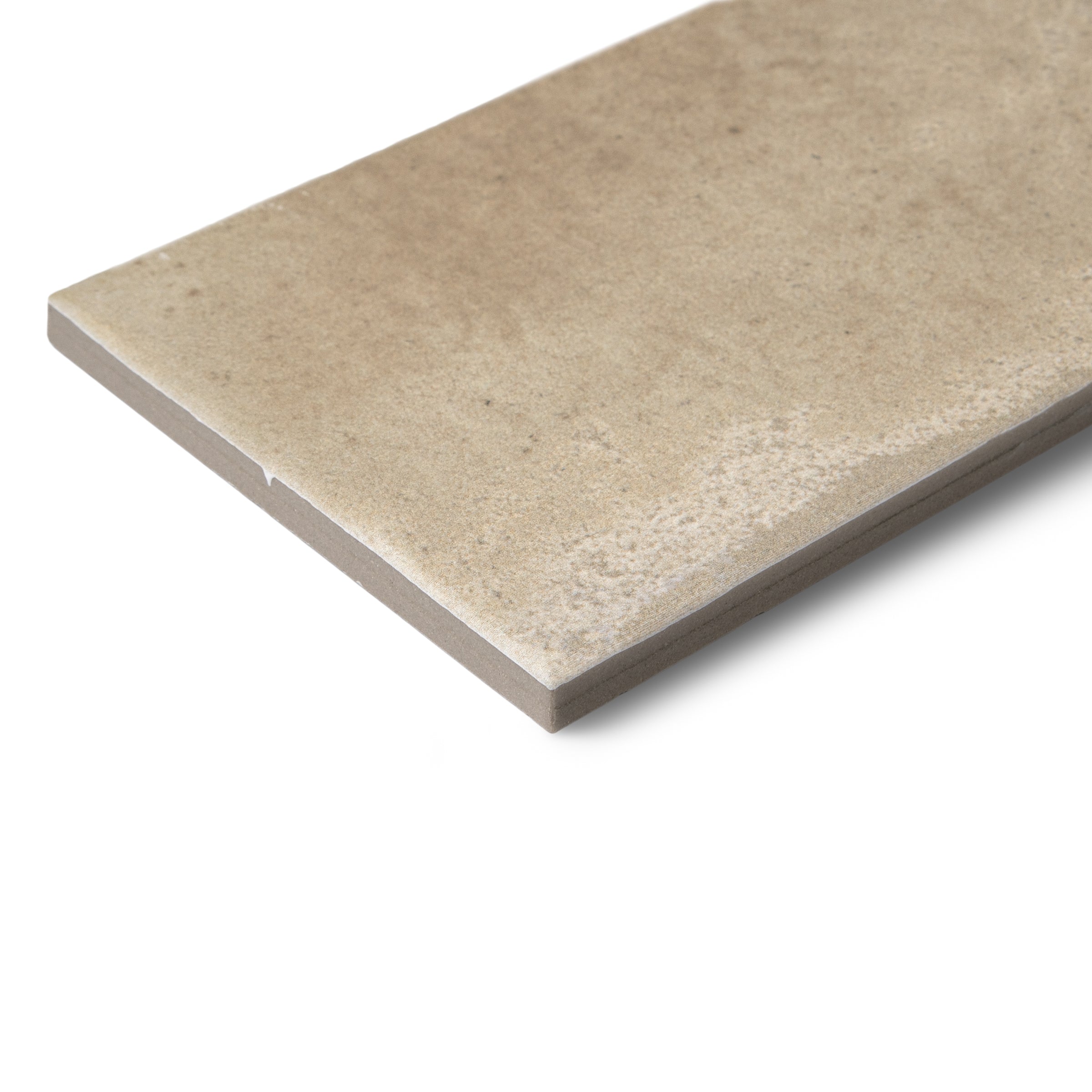 Beige rectangular ceramic tile with a slightly textured surface isolated on white background