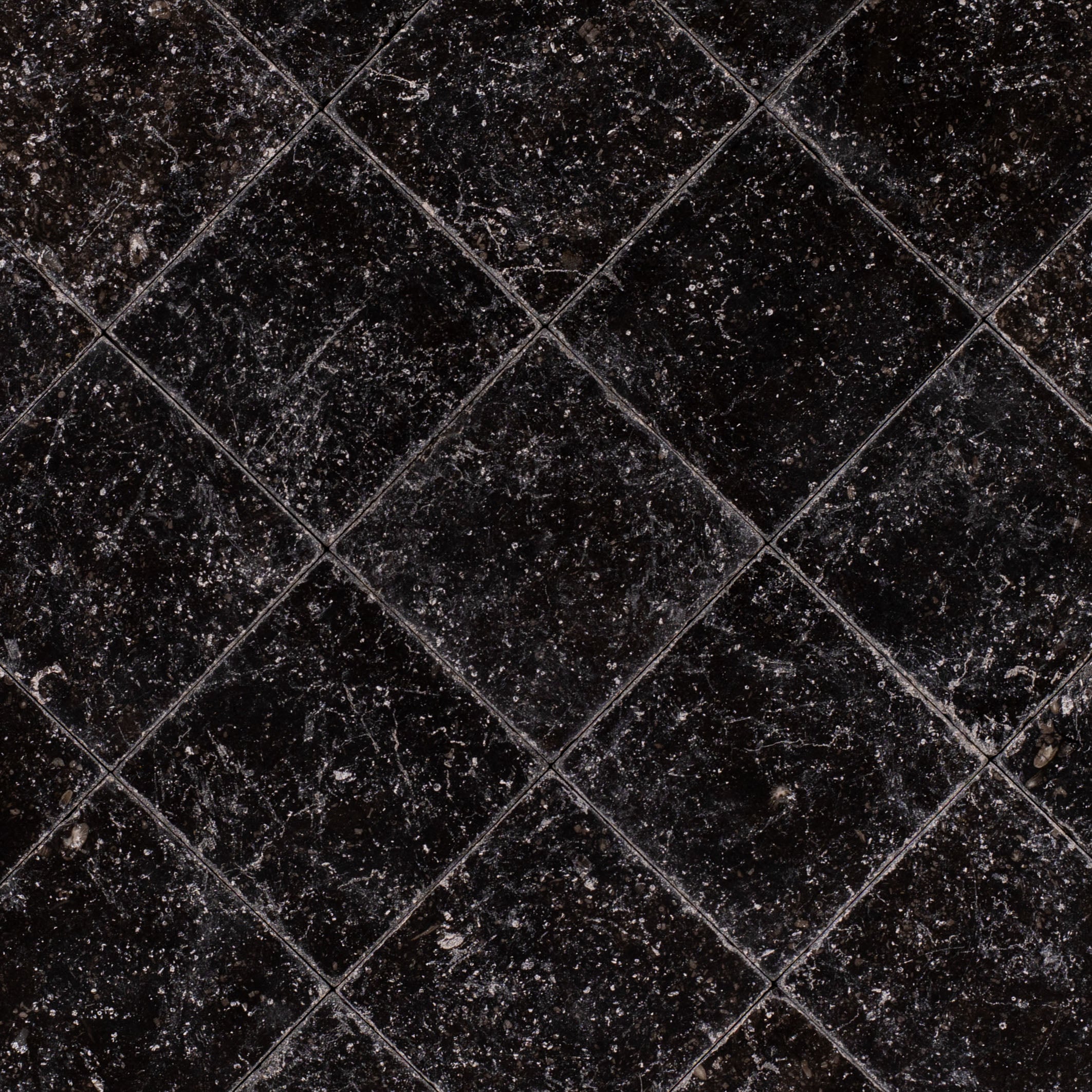 Belgian Blue 4x4 Tumbled Marble Tile in black stone with cool blue undertones from Tumbled Natural Stone Tiles and Stone collections