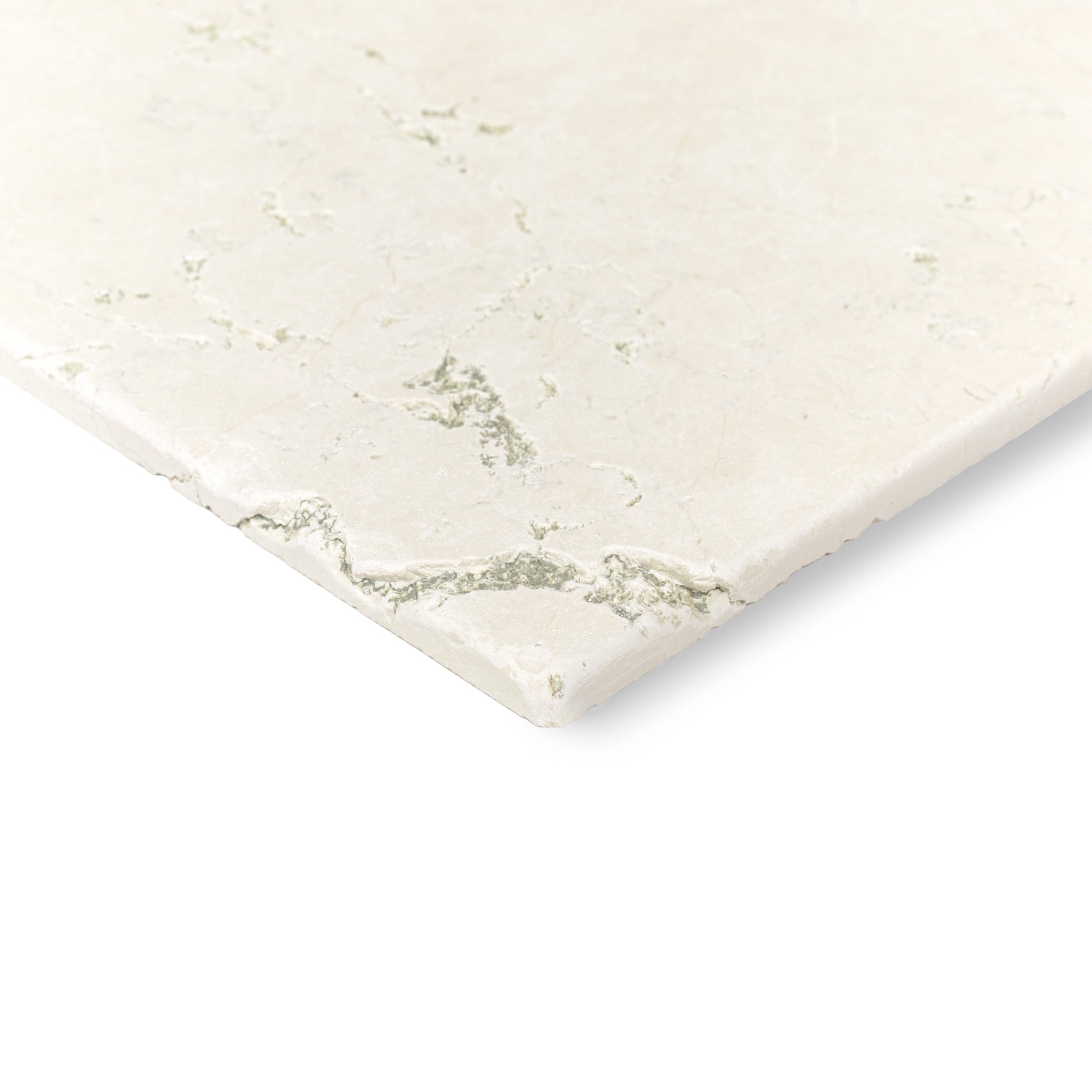Close-up of a light cream ceramic tile with subtle natural veining and a smooth matte finish showcasing elegant texture details