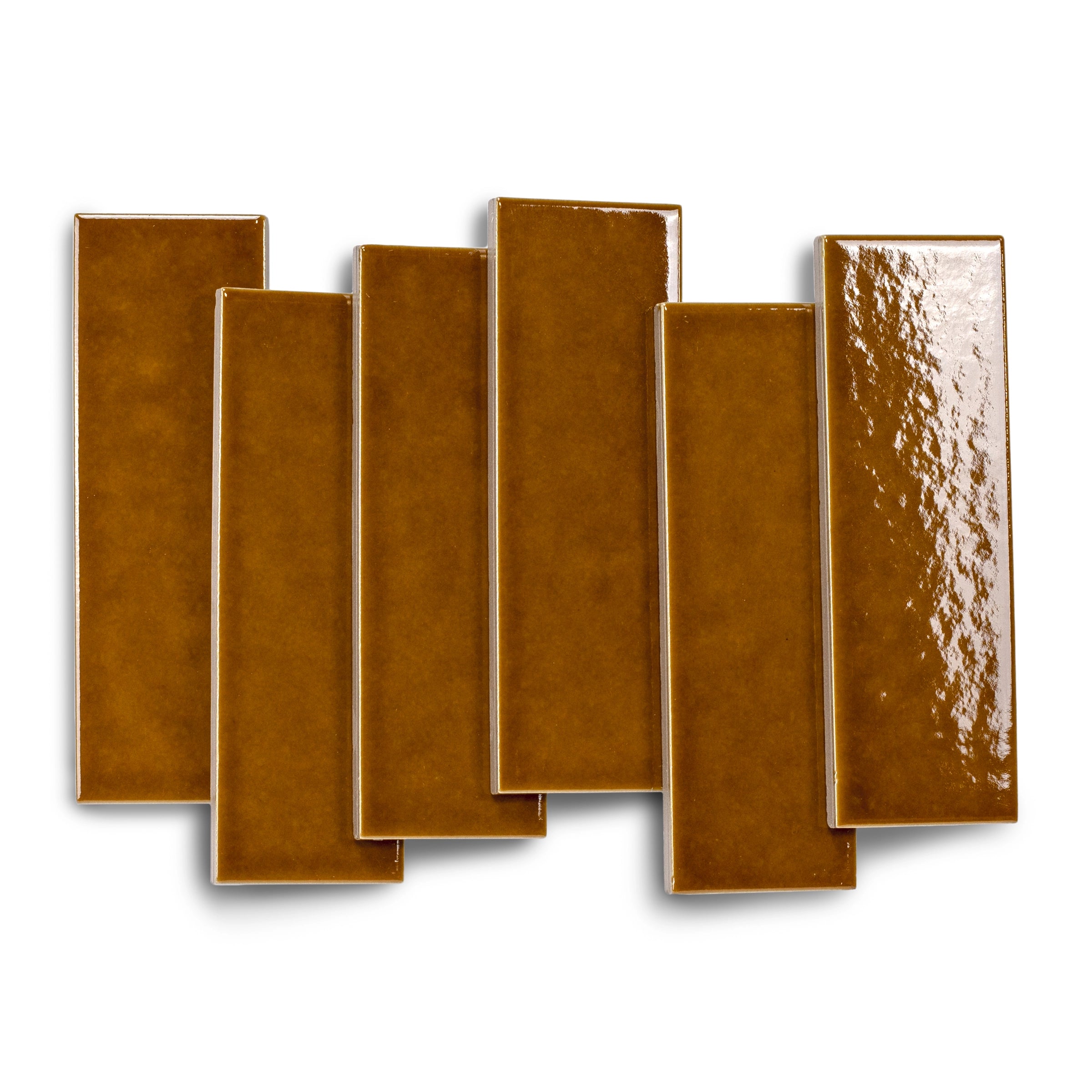 Glossy narrow ceramic tiles in warm amber brown with varied surface textures and smooth edges on white background