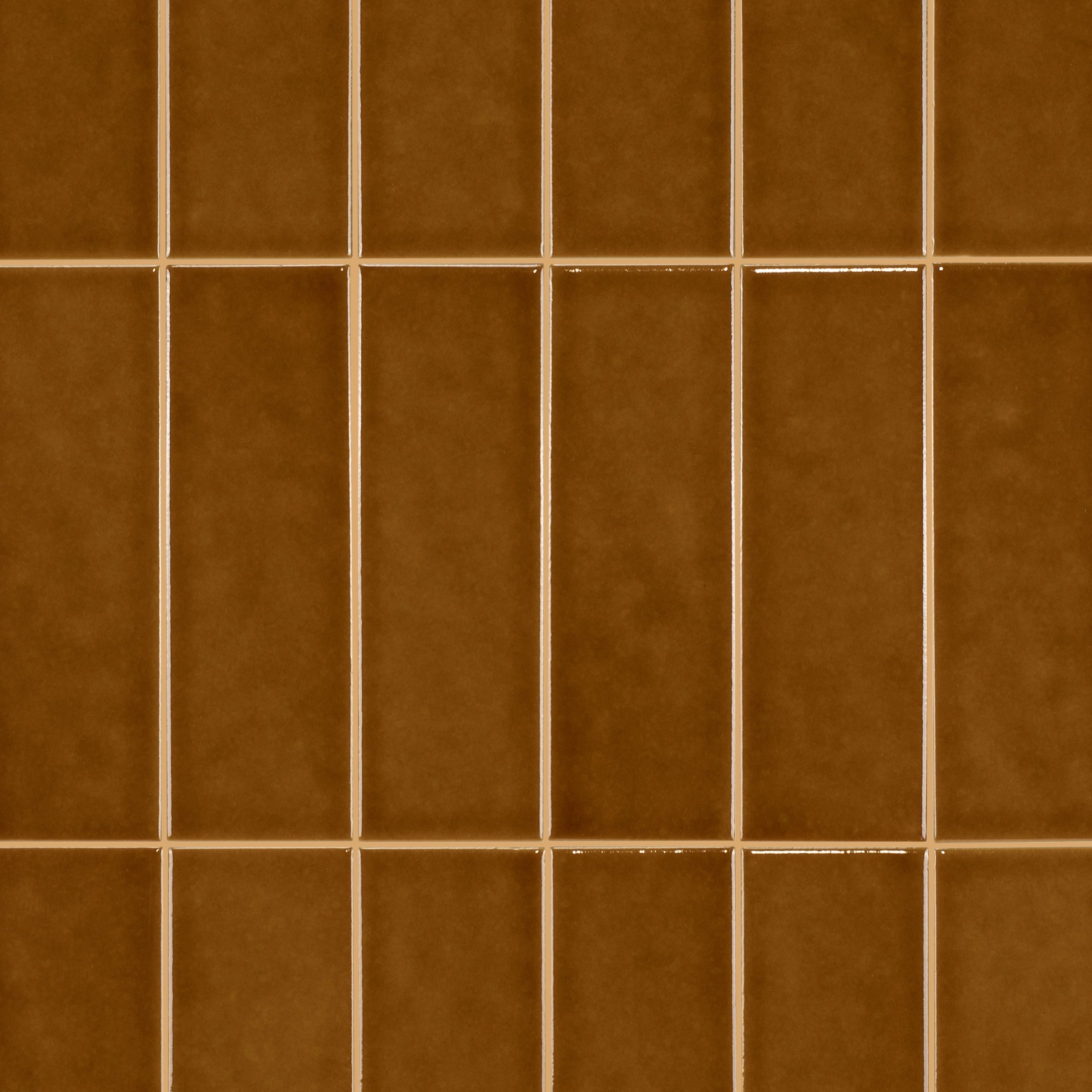 Bottega Glossy Porcelain Tile in warm amber tones showcasing small format tiles from New Arrivals Porcelain collections