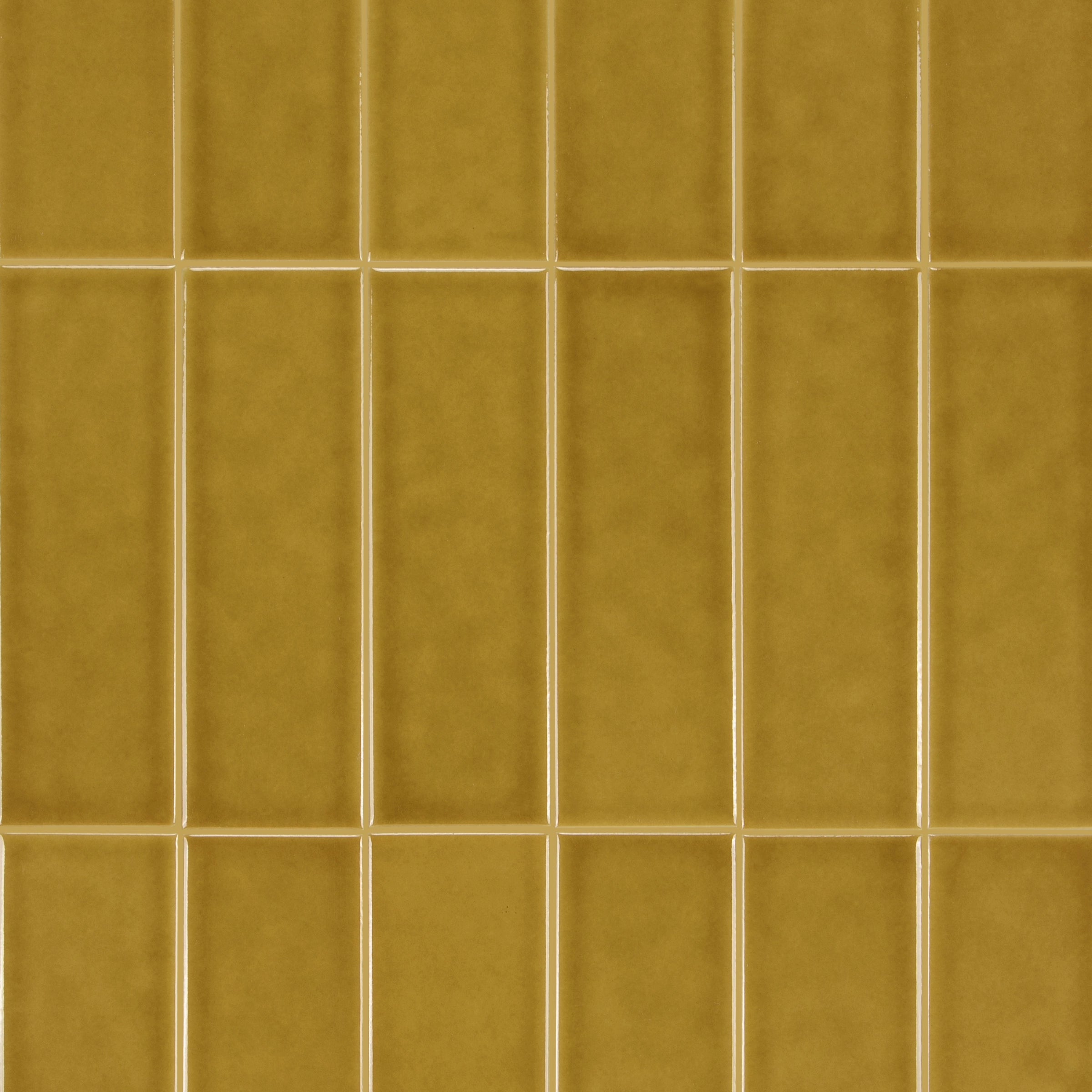Bottega Glossy Porcelain Tile in honey gold tones showcasing small format tiles from New Arrivals Porcelain collection