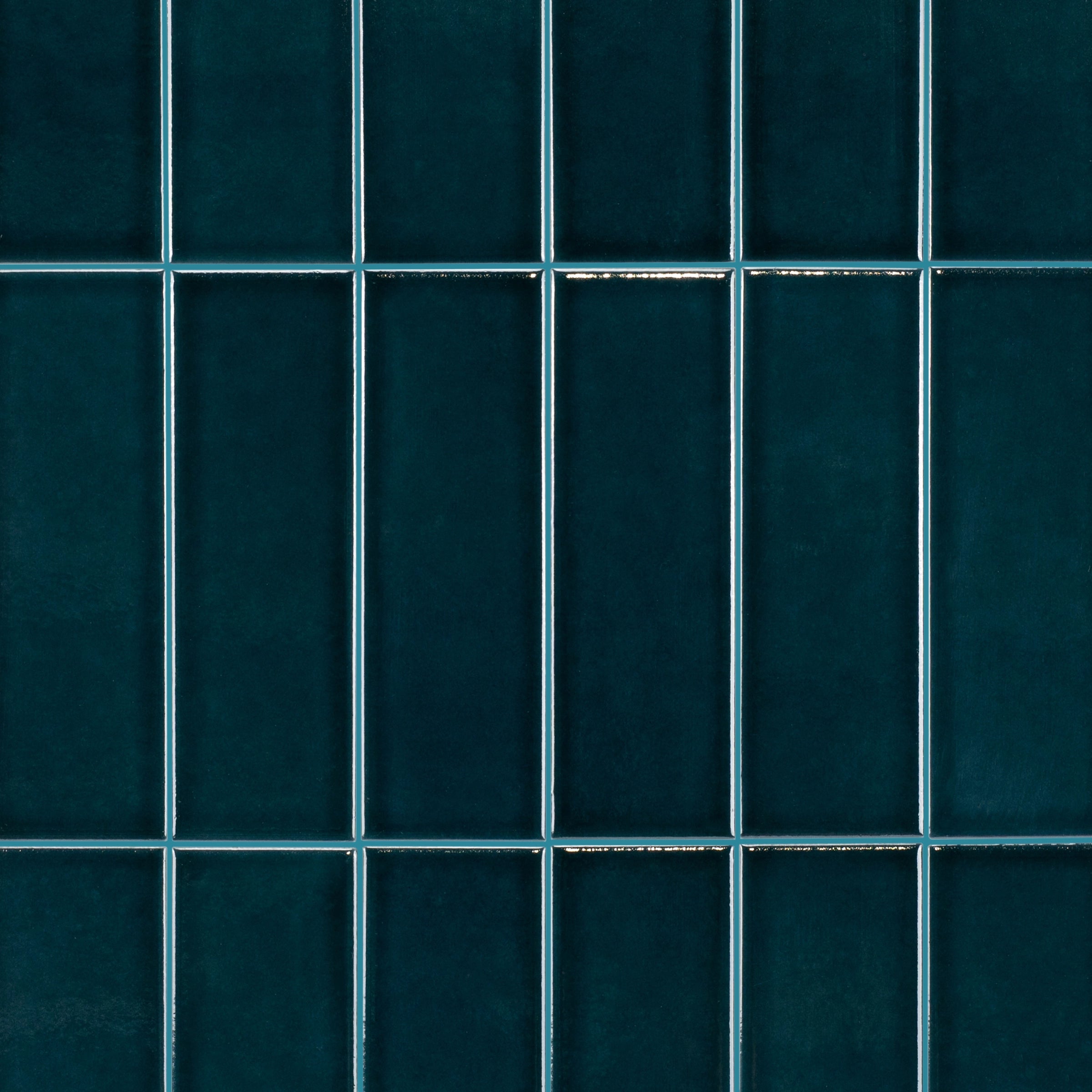 Bottega Glossy Porcelain Tile in deep navy shades featuring small format tiles from New Arrivals Porcelain collection