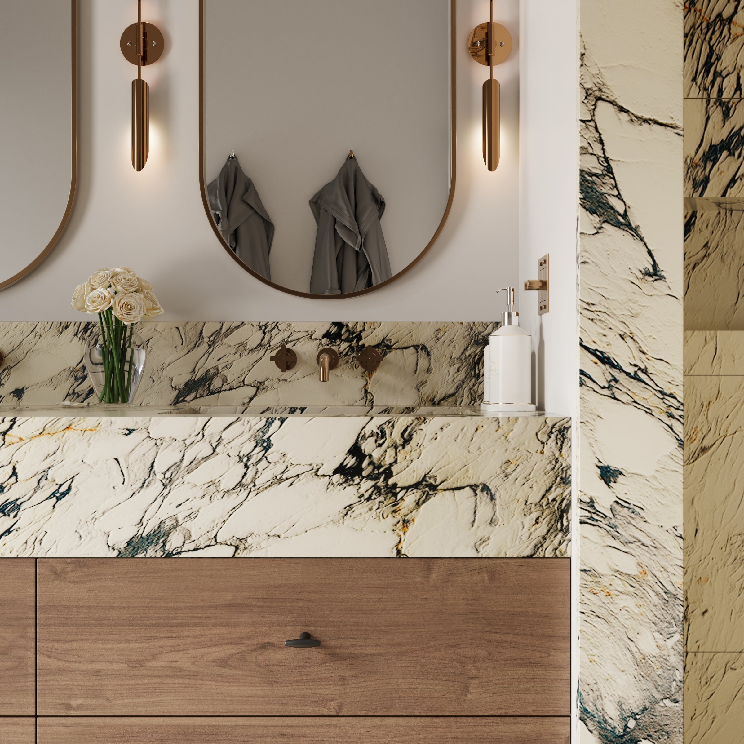 Bathroom vanity with creamy marble-look porcelain tiles featuring bold dark veining and warm wood cabinetry accents