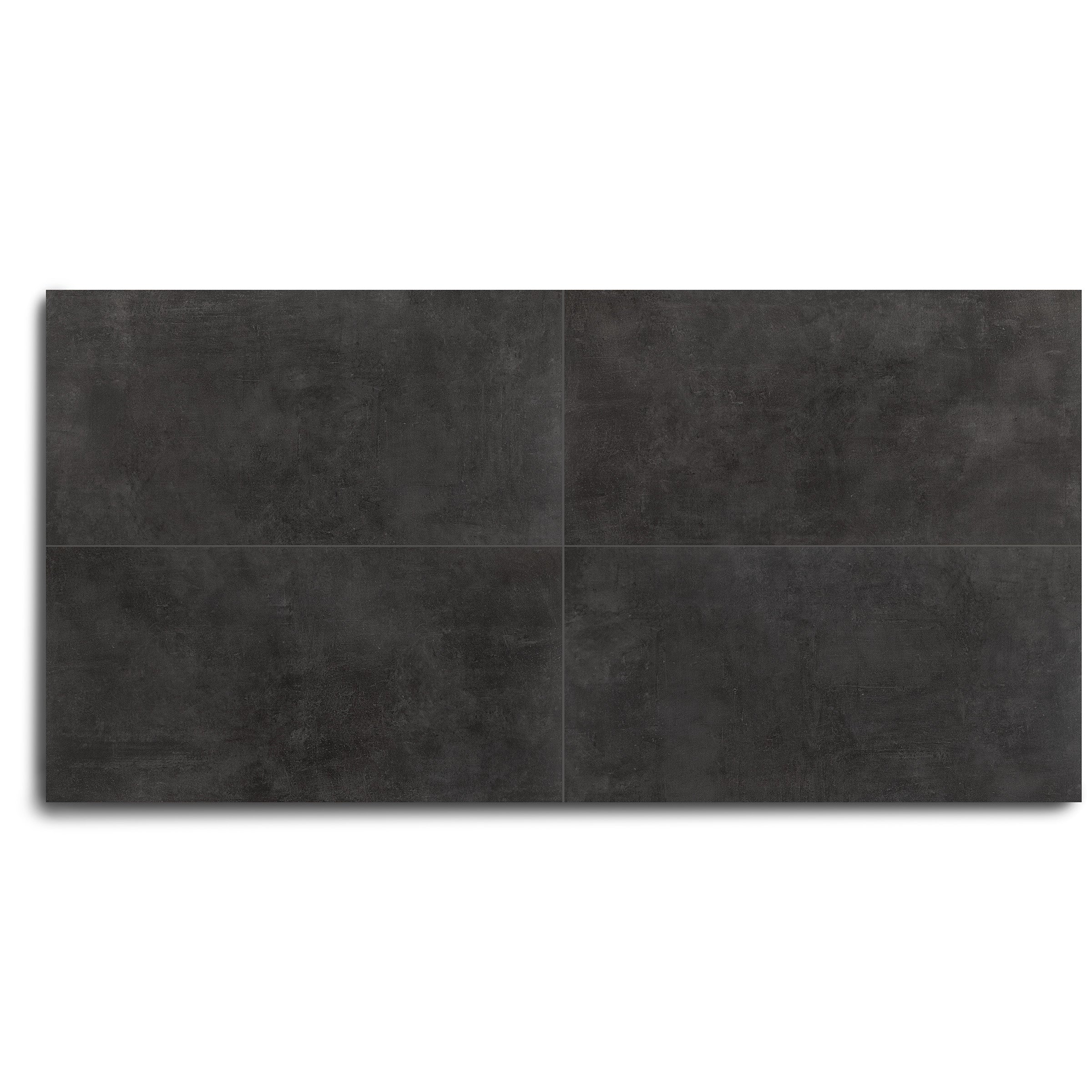 Four large dark gray concrete-look tiles arranged in a square grid