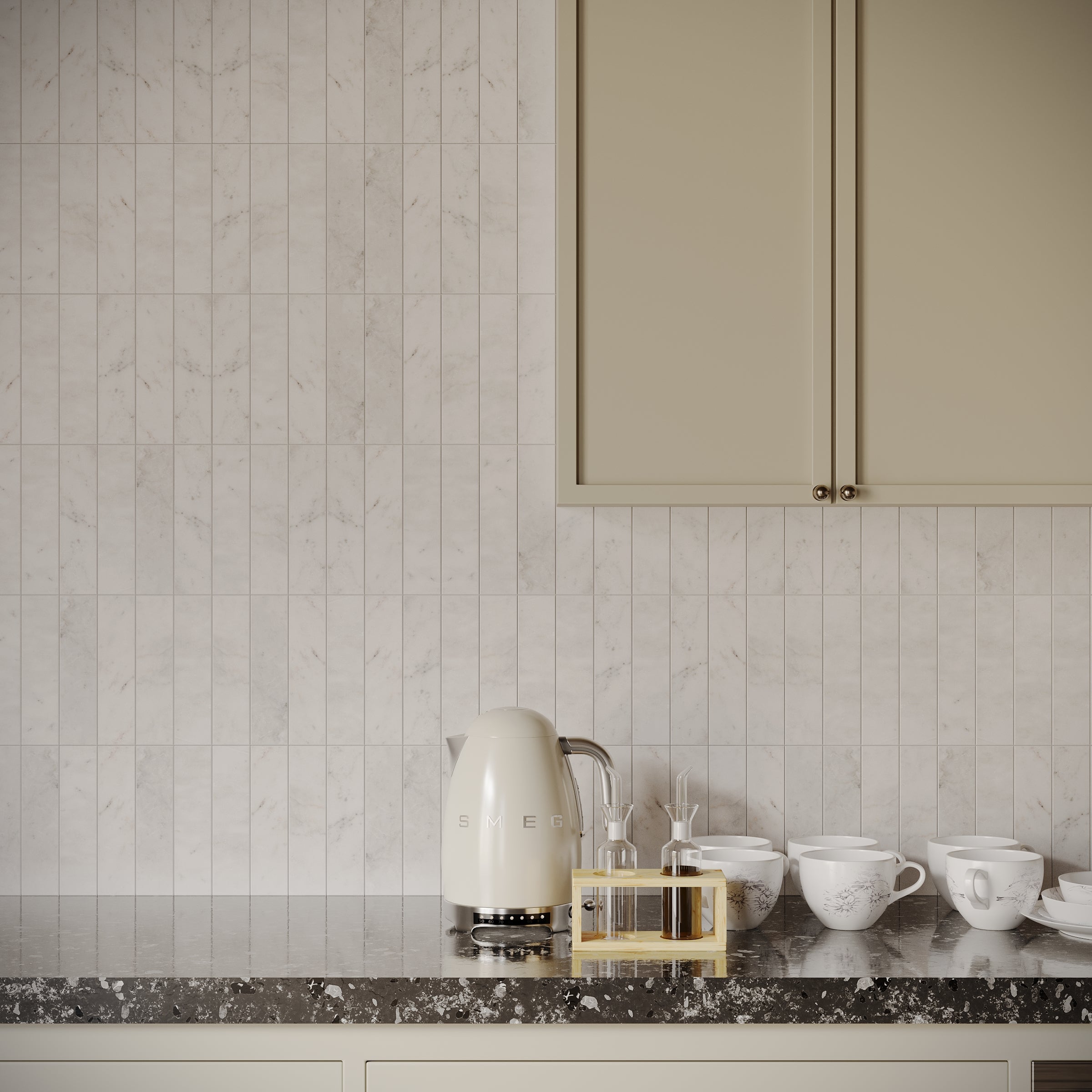 Carrara 2x8 Tumbled Marble Tile in gray and white tones from Tumbled Natural Stone Tiles Stone New Arrivals collection