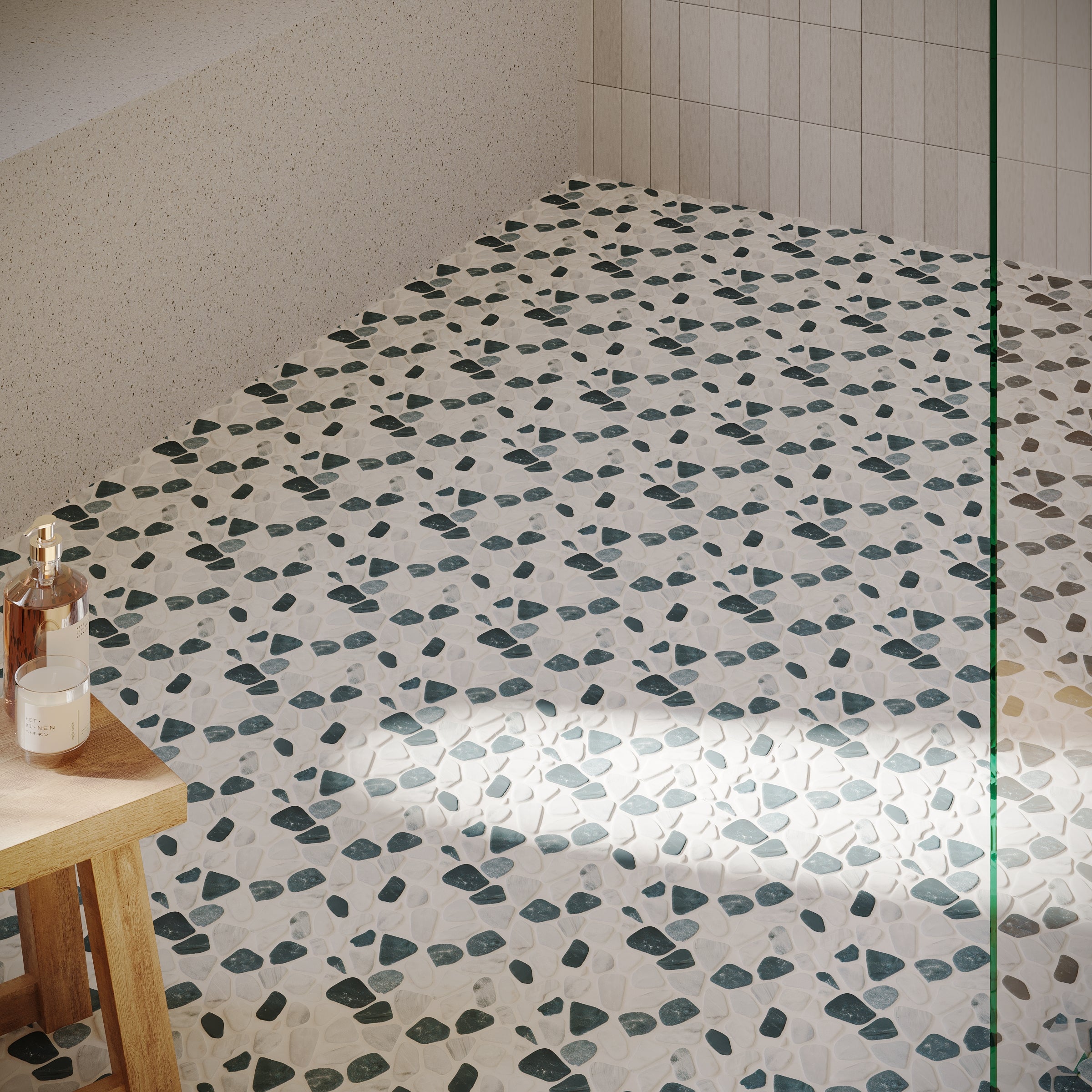 Light-filled bathroom corner with terrazzo-style porcelain tile floor, textured light walls, and wooden stool with bottles.