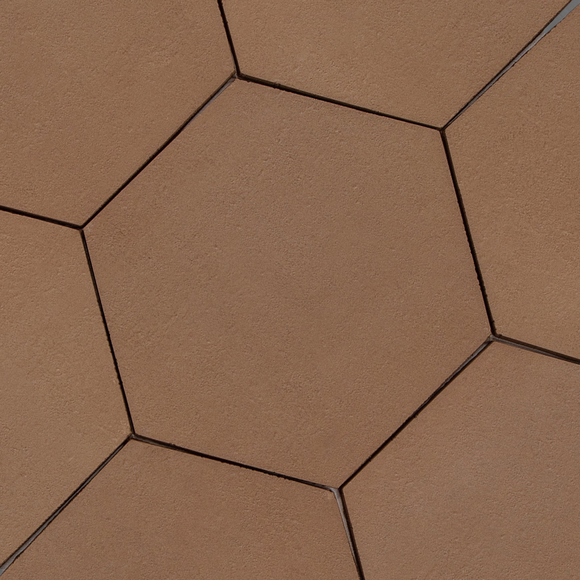 Chocolate Hexagon Textured Terracotta Tile in warm brown with natural terracotta texture from Small Format Tiles collection