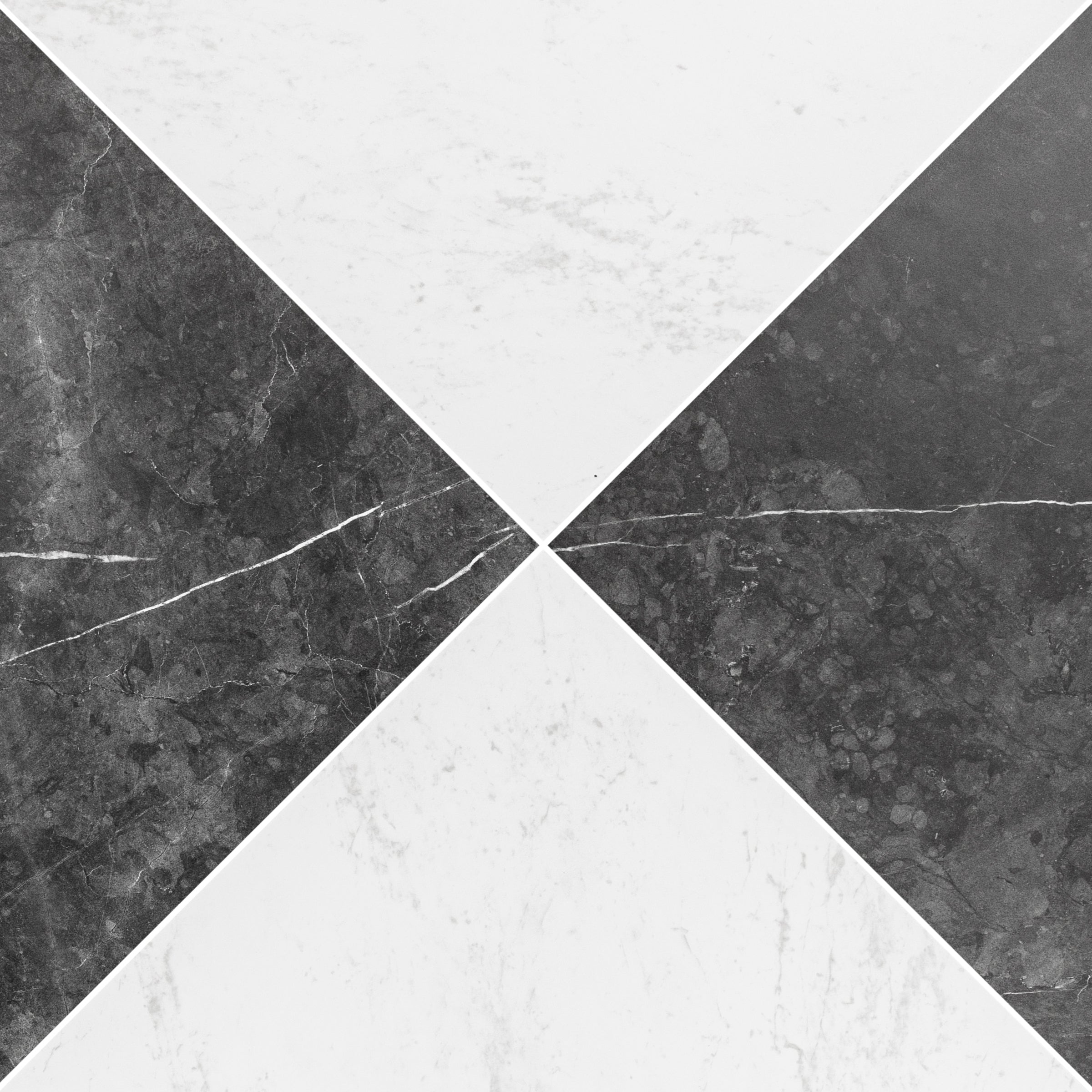 Close-up of four triangular marble-effect porcelain tiles in contrasting black and white arranged to form a geometric diamond pattern