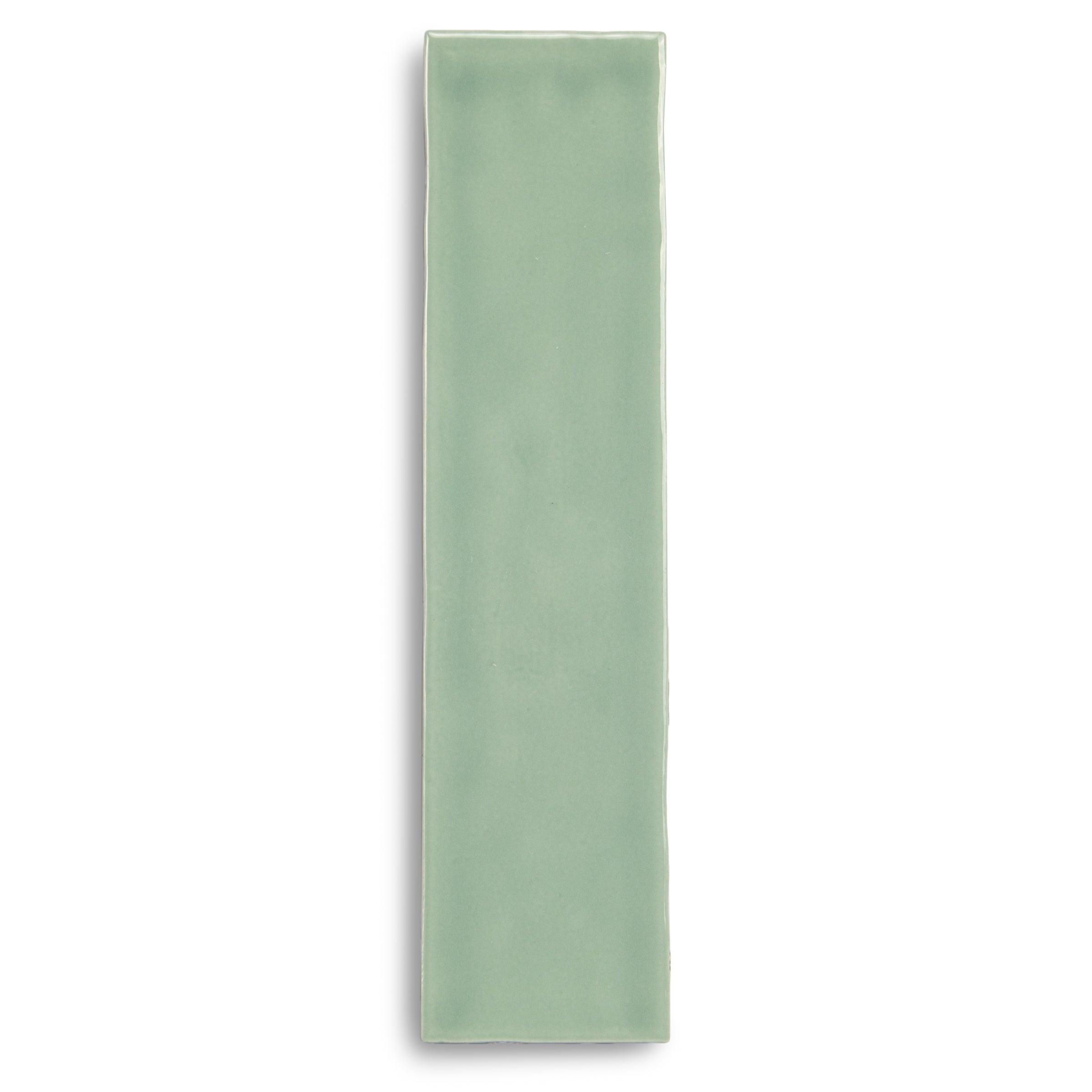 Pale green rectangular ceramic tile on a white background