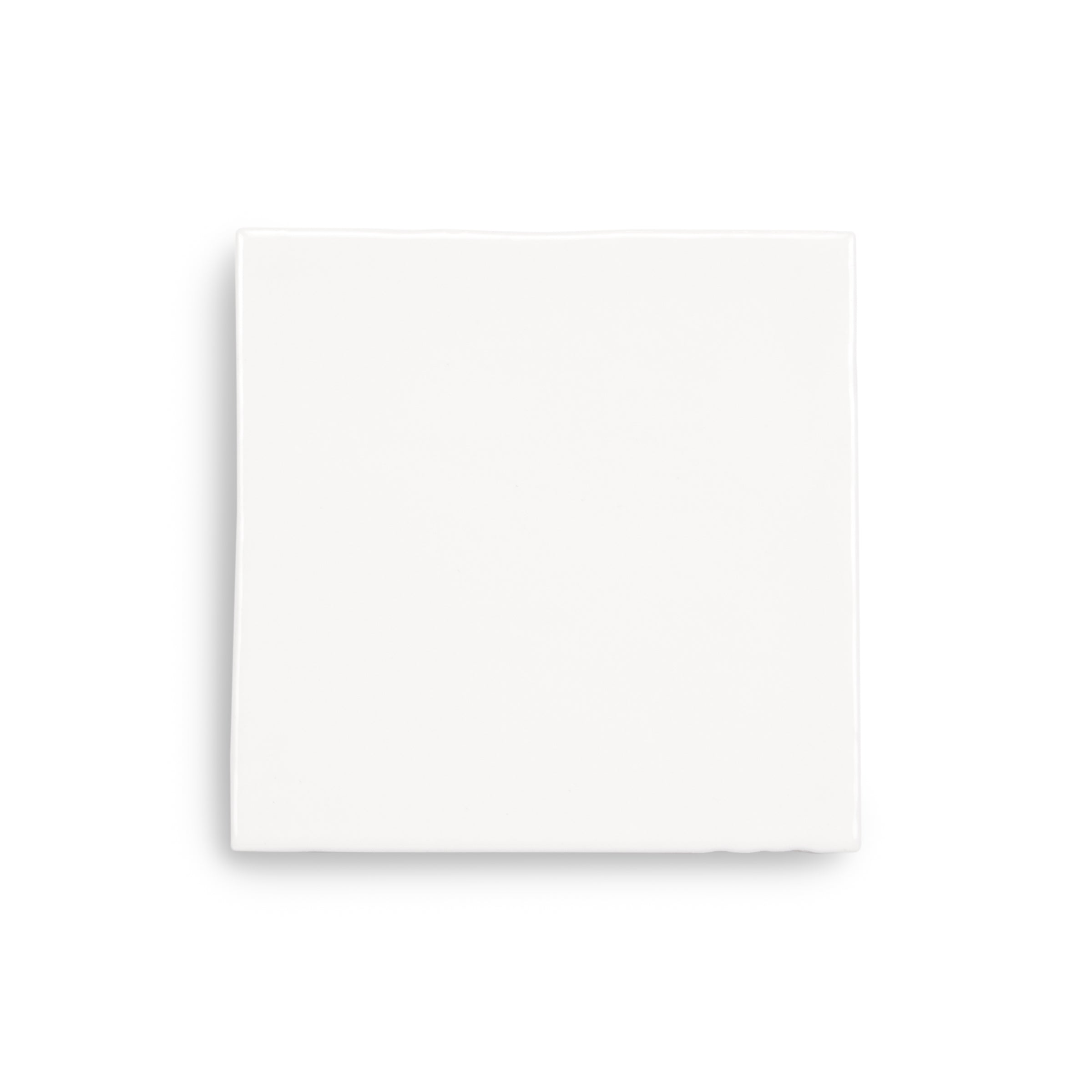 Plain white square tile on a white background