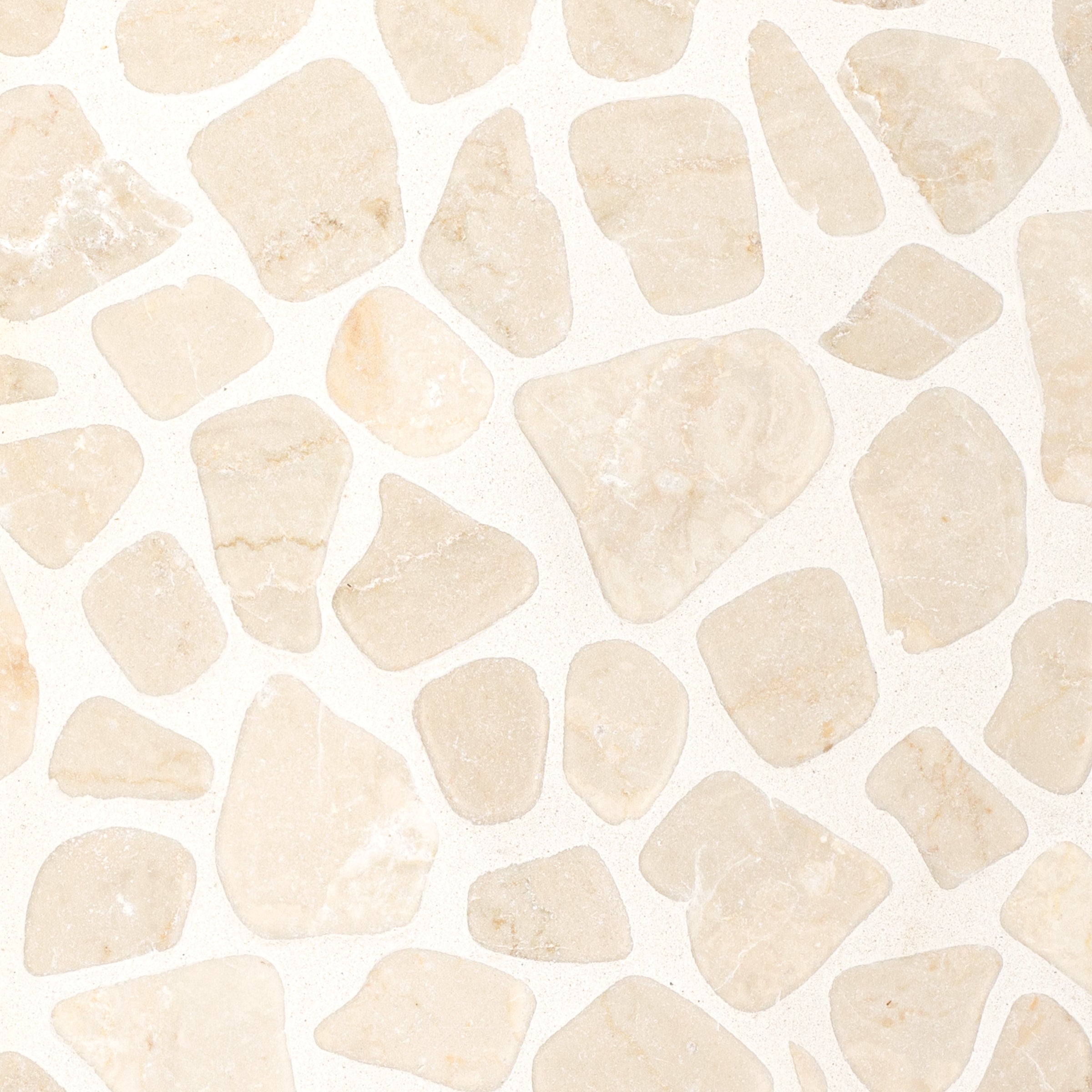 Crema Tumbled Pebble Mosaic with warm beige stone pebbles in varied shapes from Tumbled Pebble Mosaics Stone New Arrivals collection