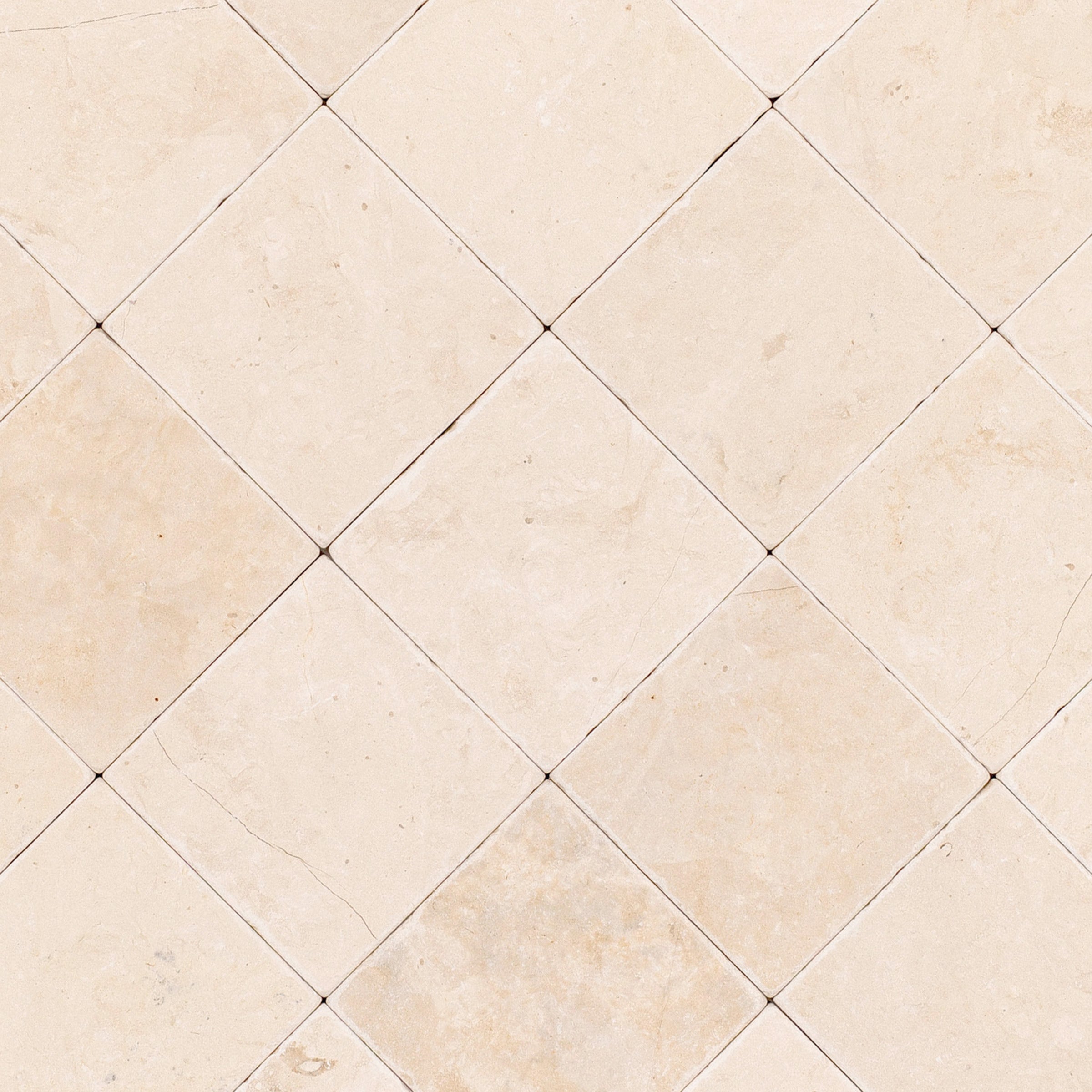 Desert Tea 4x4 Tumbled Marble Tile in beige stone with sand, cream, and soft gold tones from Tumbled Natural Stone Tiles collection