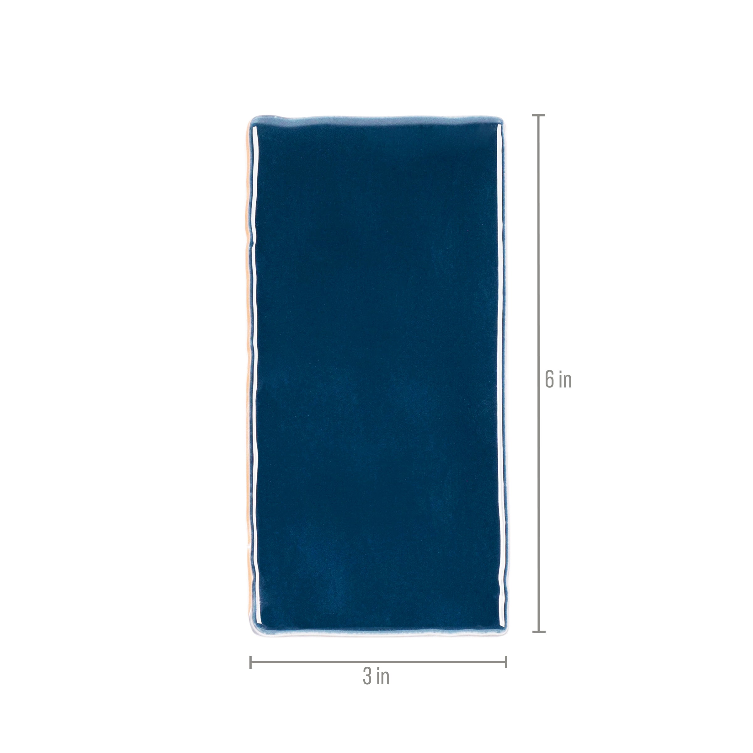 Marine 3x6 Glossy Ceramic Tile in deep teal-navy ceramic with a rich glossy finish and slightly irregular edges from Seville collection