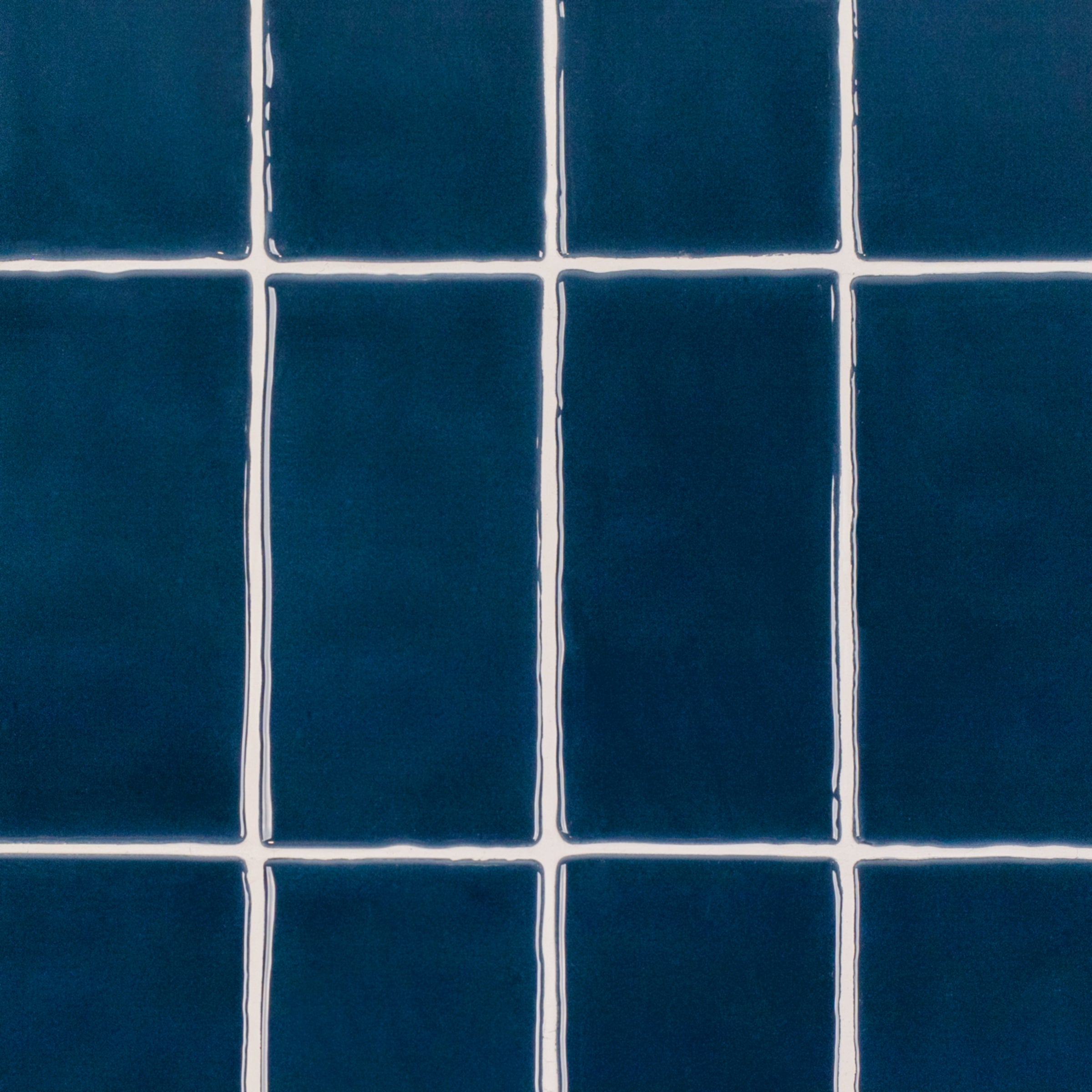 Marine 3x6 Glossy Ceramic Tile in deep blue with a rich gloss and subtly irregular edges from Seville Glossy Ceramic Tiles