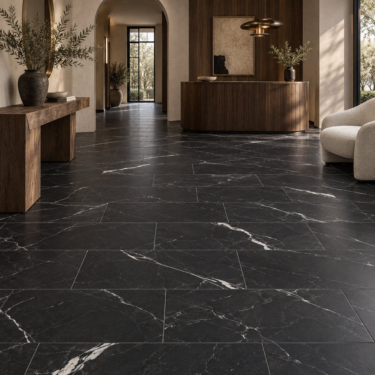 Black marble-look large format tiles in an elegant modern interior