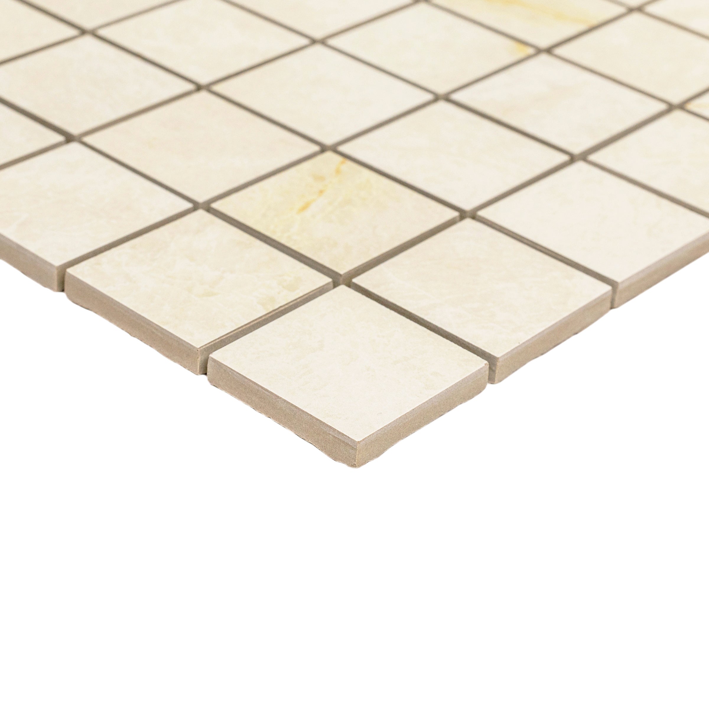 Light cream ceramic tiles with faint natural veining arranged in a square grid on a white background
