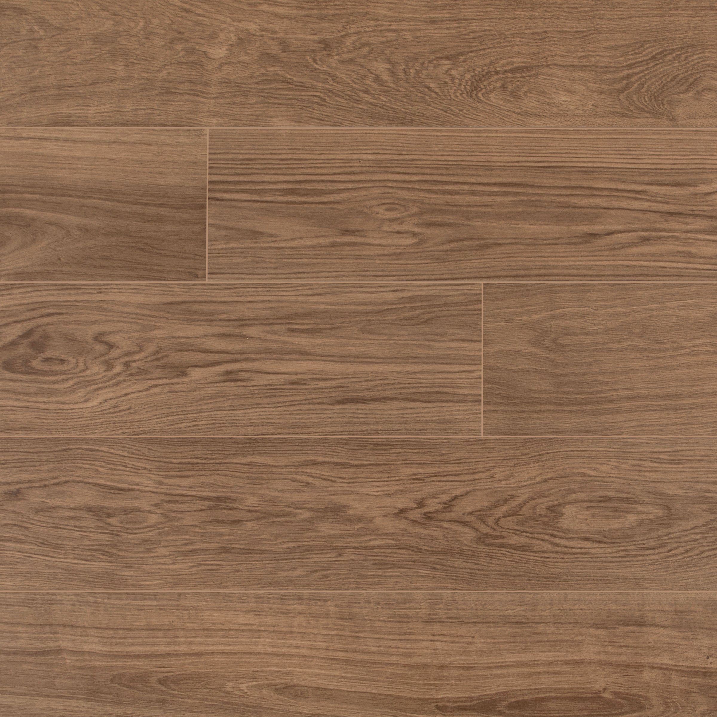 Nut 9.5x60 Wood Look Porcelain Tile in rich brown with natural oak grain from Wood Edition Porcelain Tiles collection