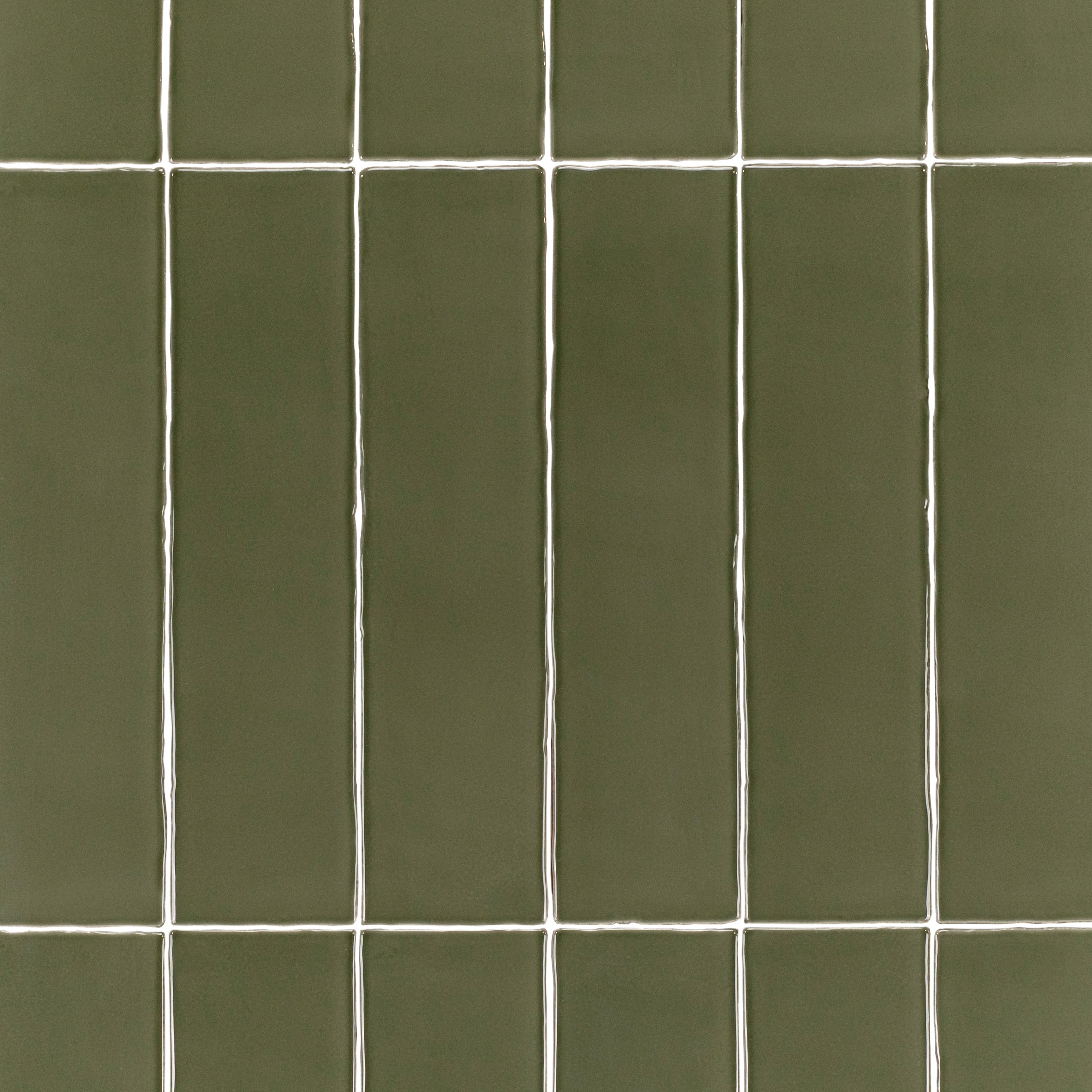 Olive 3x12 Glossy Ceramic Tile in deep muted green with rich gloss and gently irregular edges from Seville Small Format Tiles collection