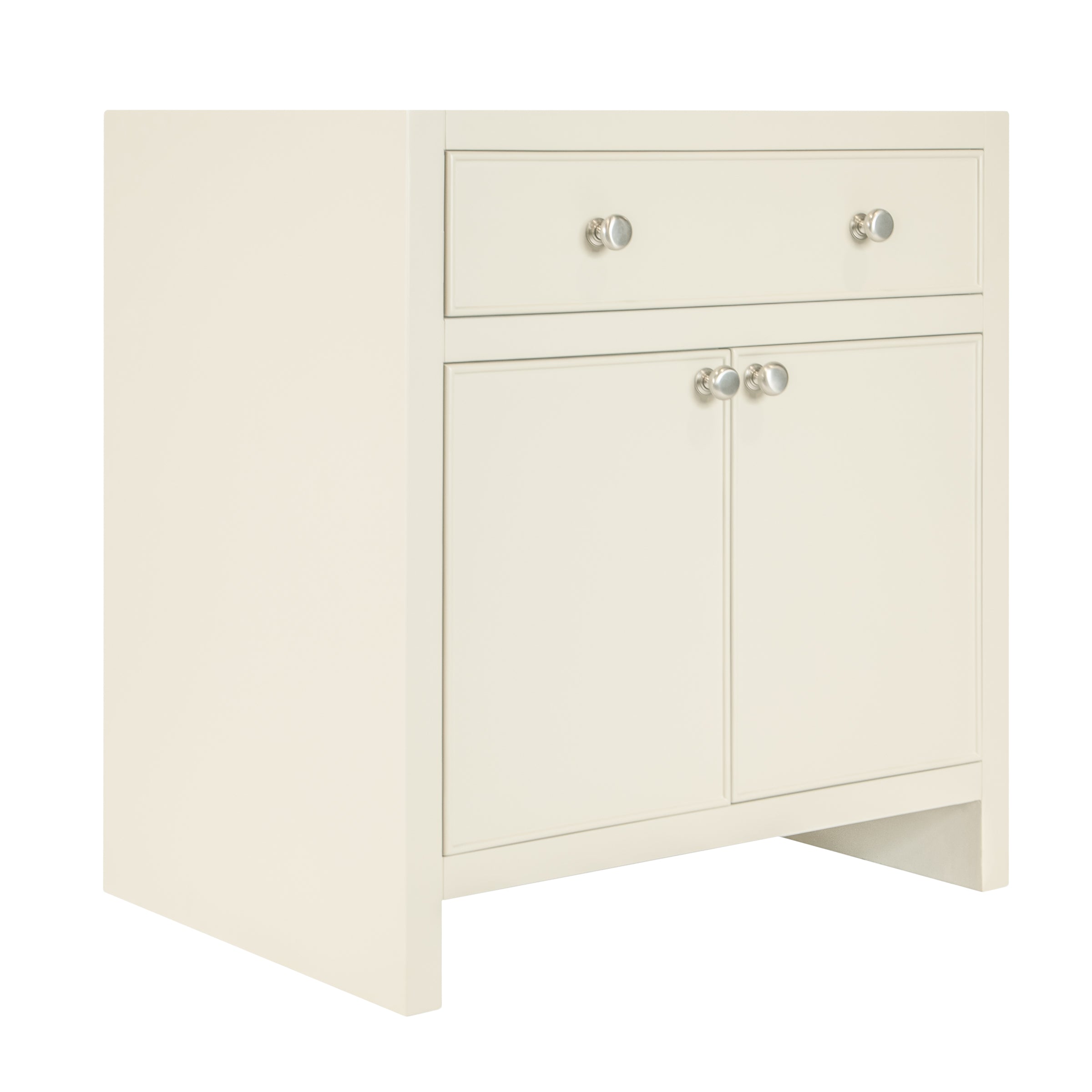 Cream-colored storage cabinet with a drawer above two doors, featuring round silver knobs and clean lines