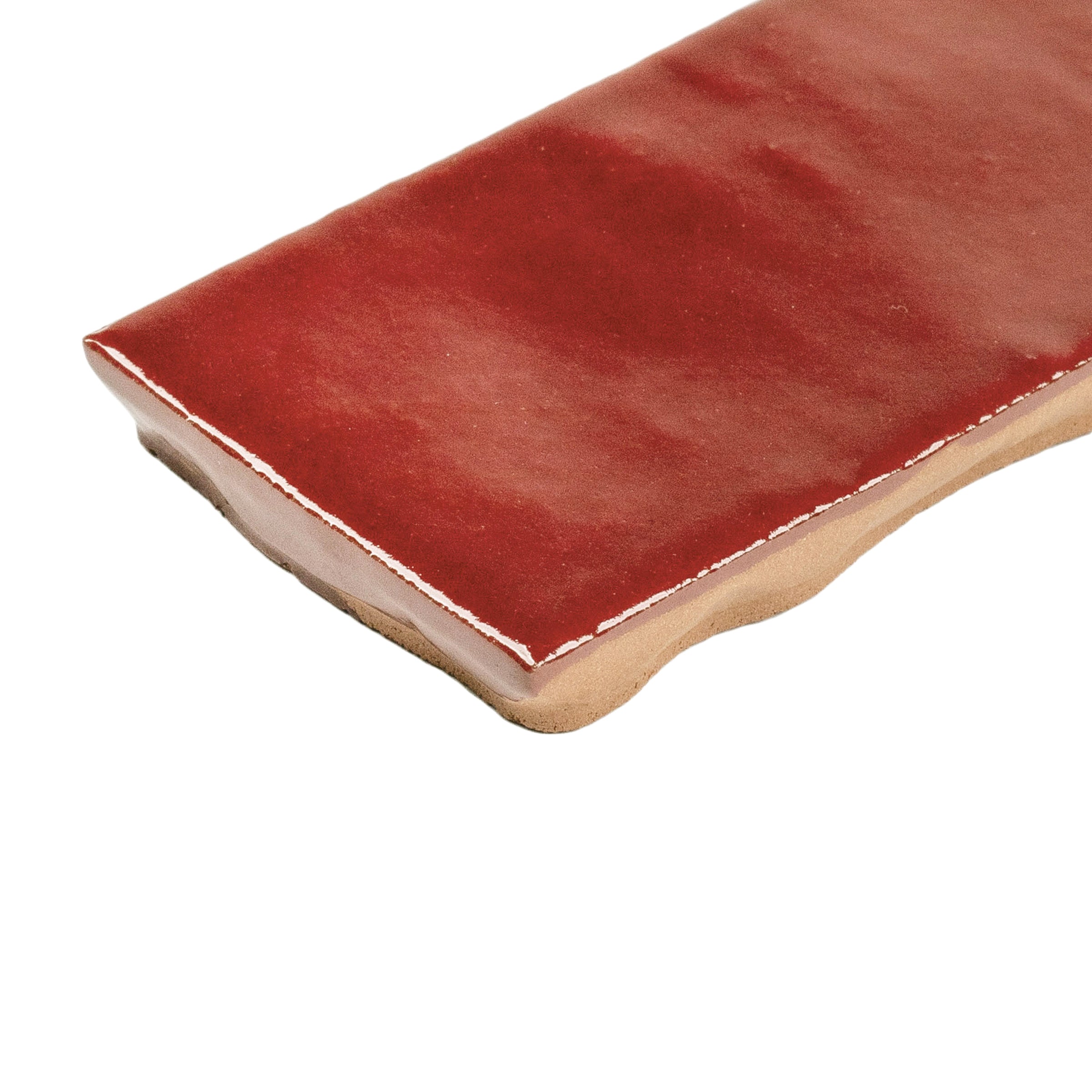 Ruby Glossy Ceramic Tile in red ceramic with handcrafted texture from Small Format Tiles and Zel Glazed Ceramic Tiles collections