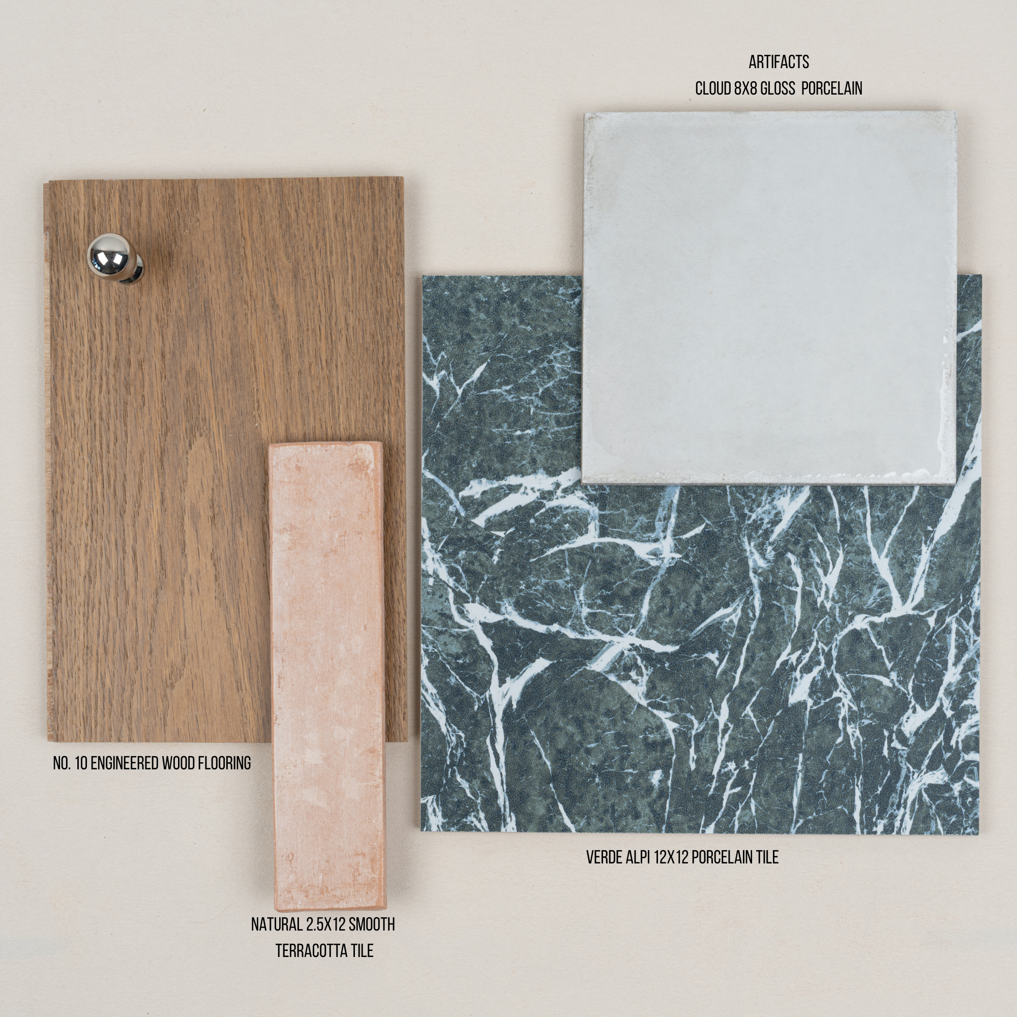 Arrangement of engineered wood, smooth terracotta, dark green marble-effect porcelain, and light grey gloss porcelain tiles on neutral background
