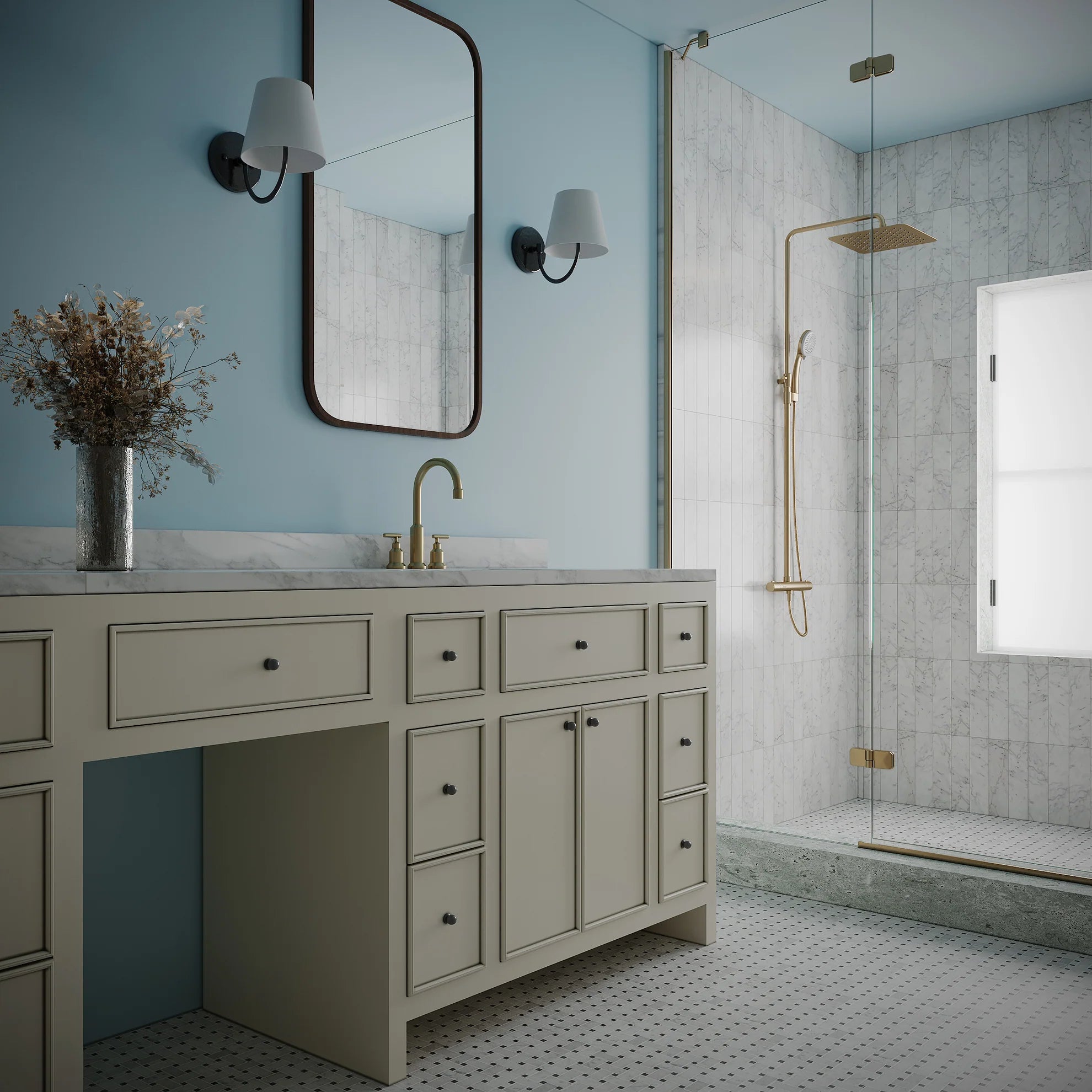 Modern bathroom with beige vanity, brass fixtures, blue walls, large rectangular mirror, and glass shower with marble tiles