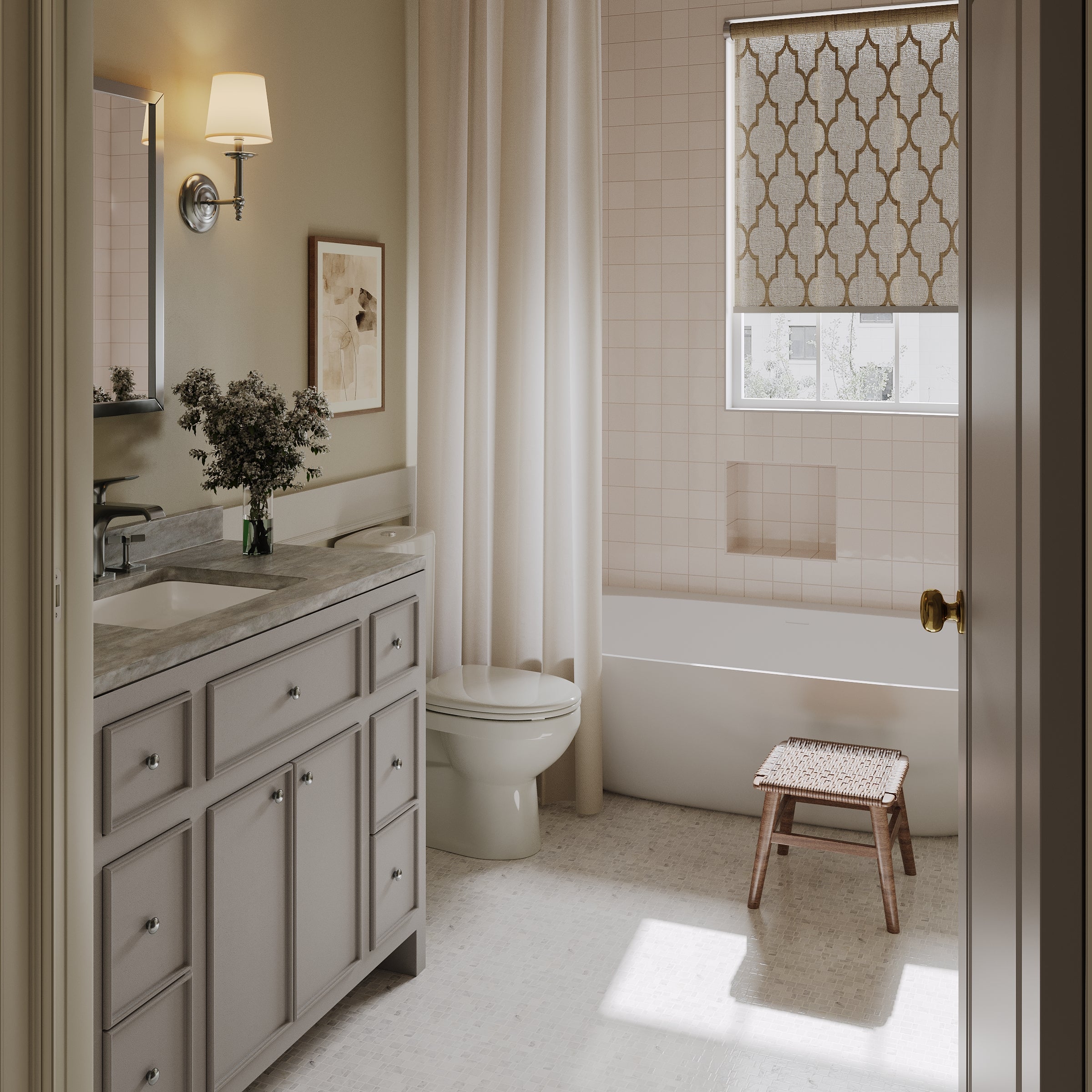 Bright bathroom with marble countertop vanity, beige tiles, patterned window shade, and wooden stool by tub.