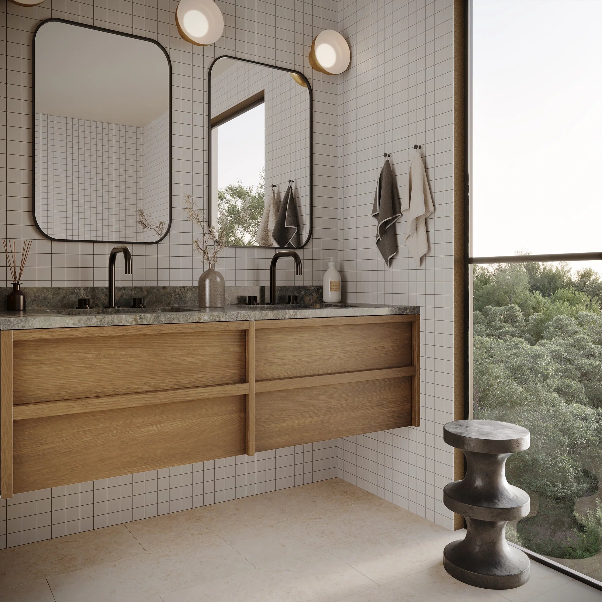 Modern bathroom with wood vanity, dual mirrors, small format tiles, and large window overlooking trees and nature view