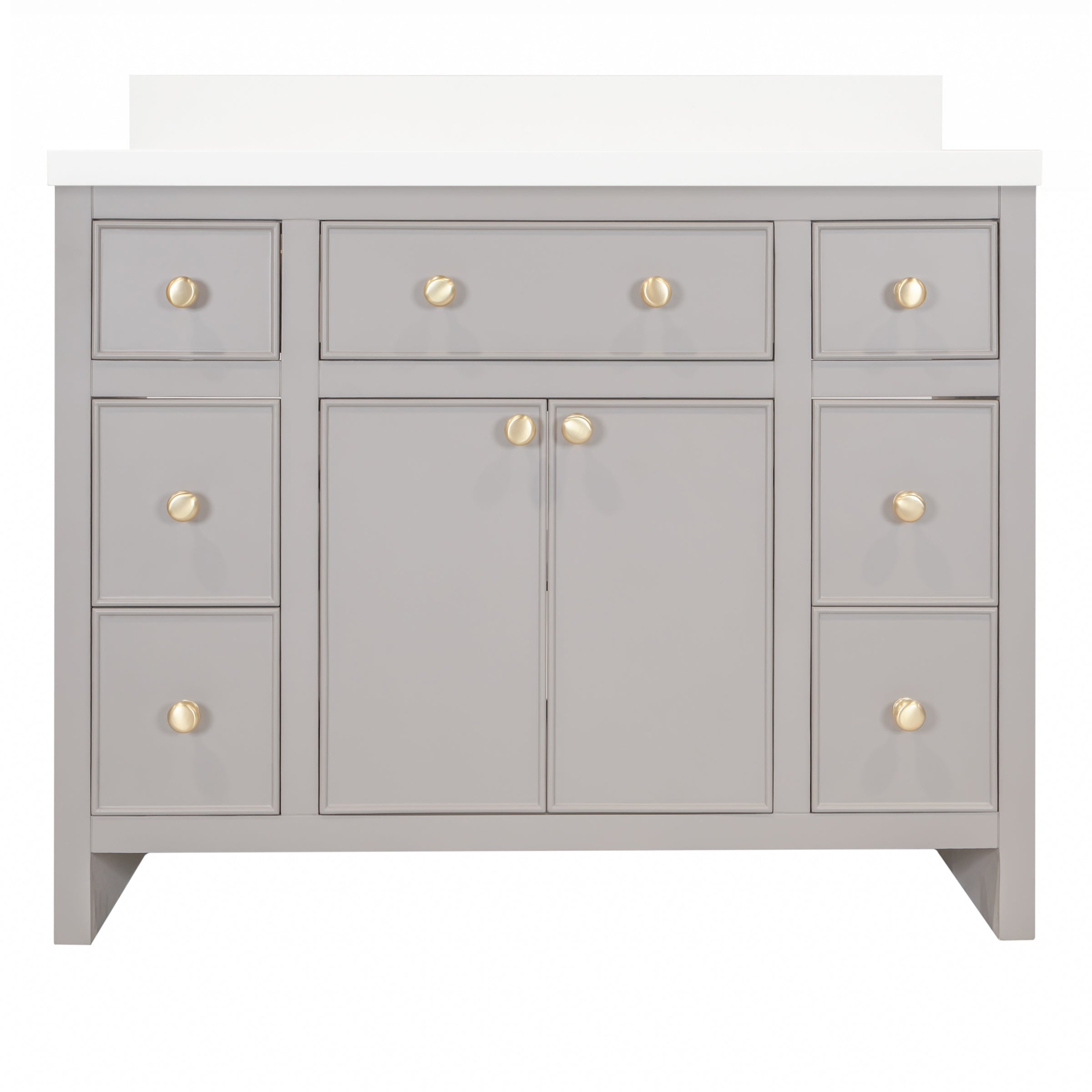 Gray bathroom vanity with white countertop and gold round knobs on multiple drawers and cabinet doors