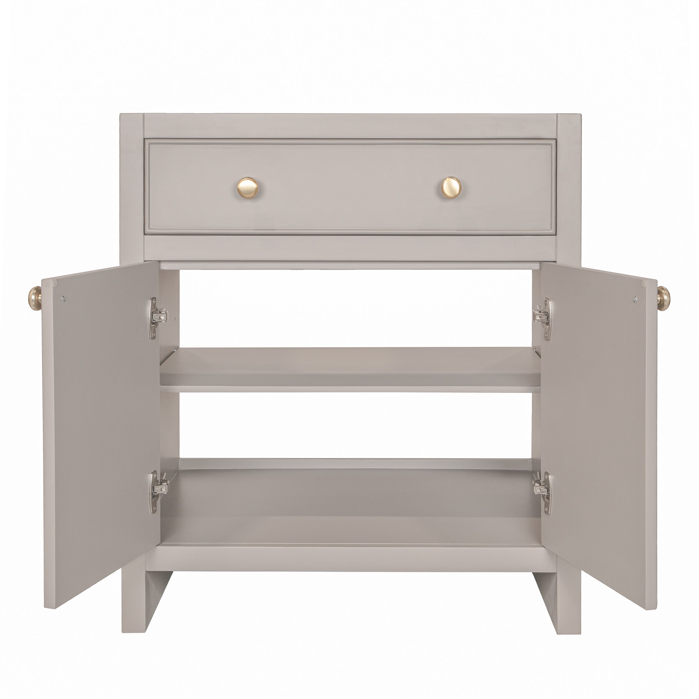 Light gray vanity cabinet with open double doors and drawer, featuring round brass knobs and internal shelving