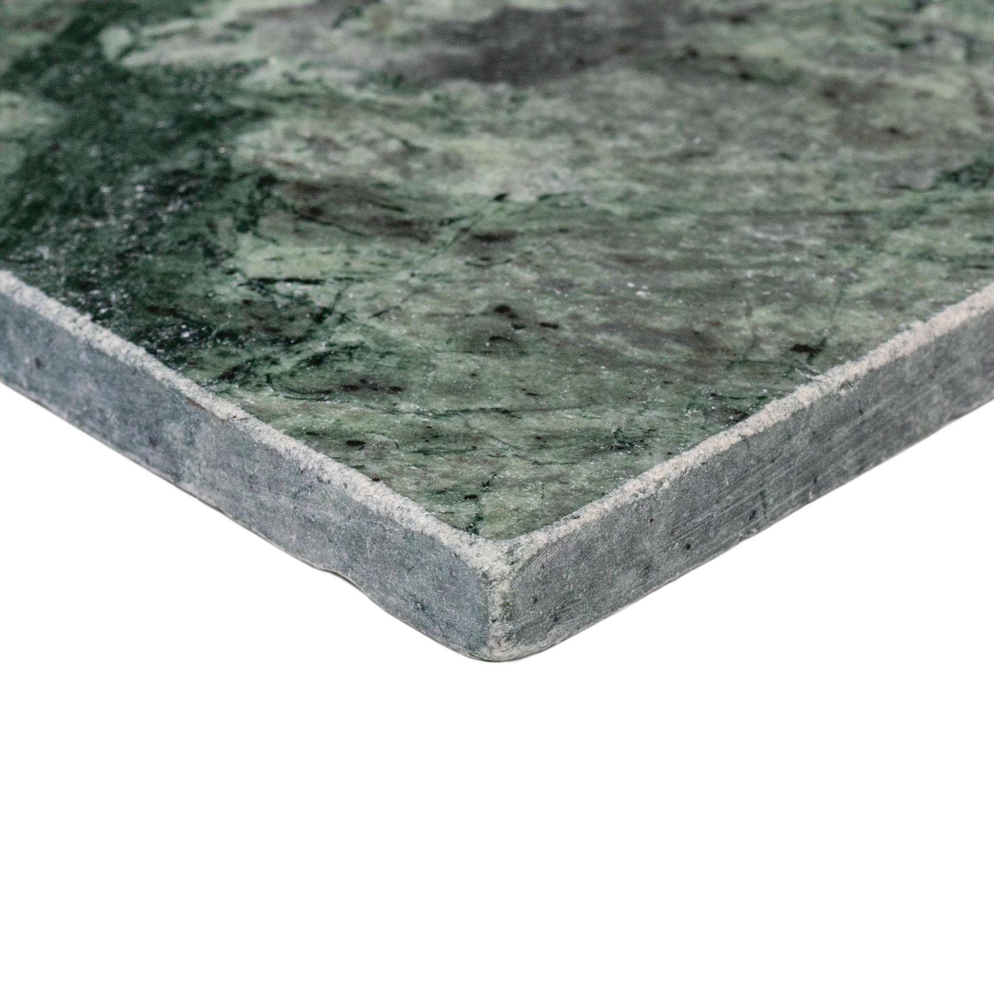 Verde Guatemala 4x4 Tumbled Marble Tile in emerald green with bold white veining from Tumbled Natural Stone Tiles collection