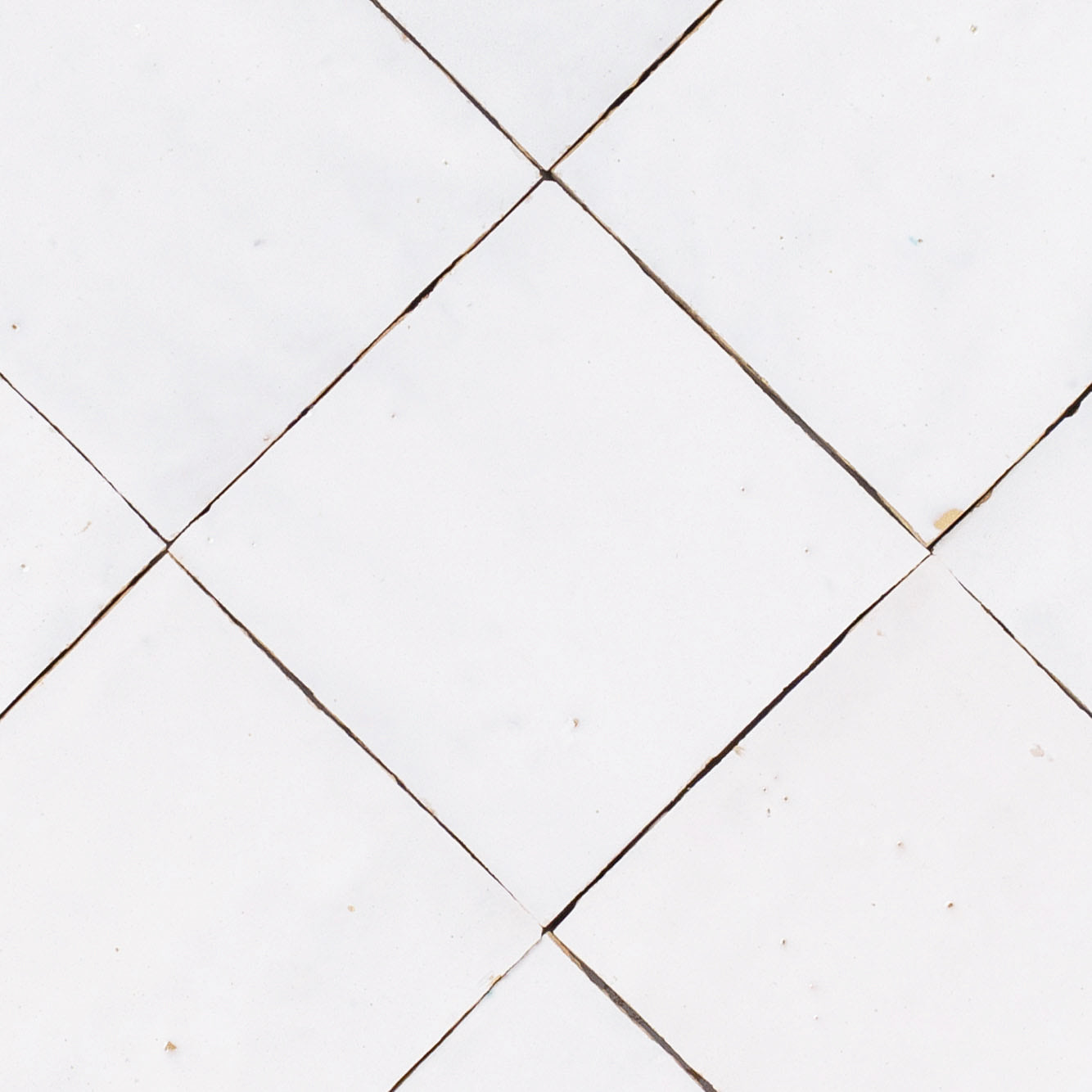 White Glazed Zellige Tile featuring handmade terracotta texture with glossy finish from Small Format Tiles and Handmade Moroccan Zellige Tiles collections