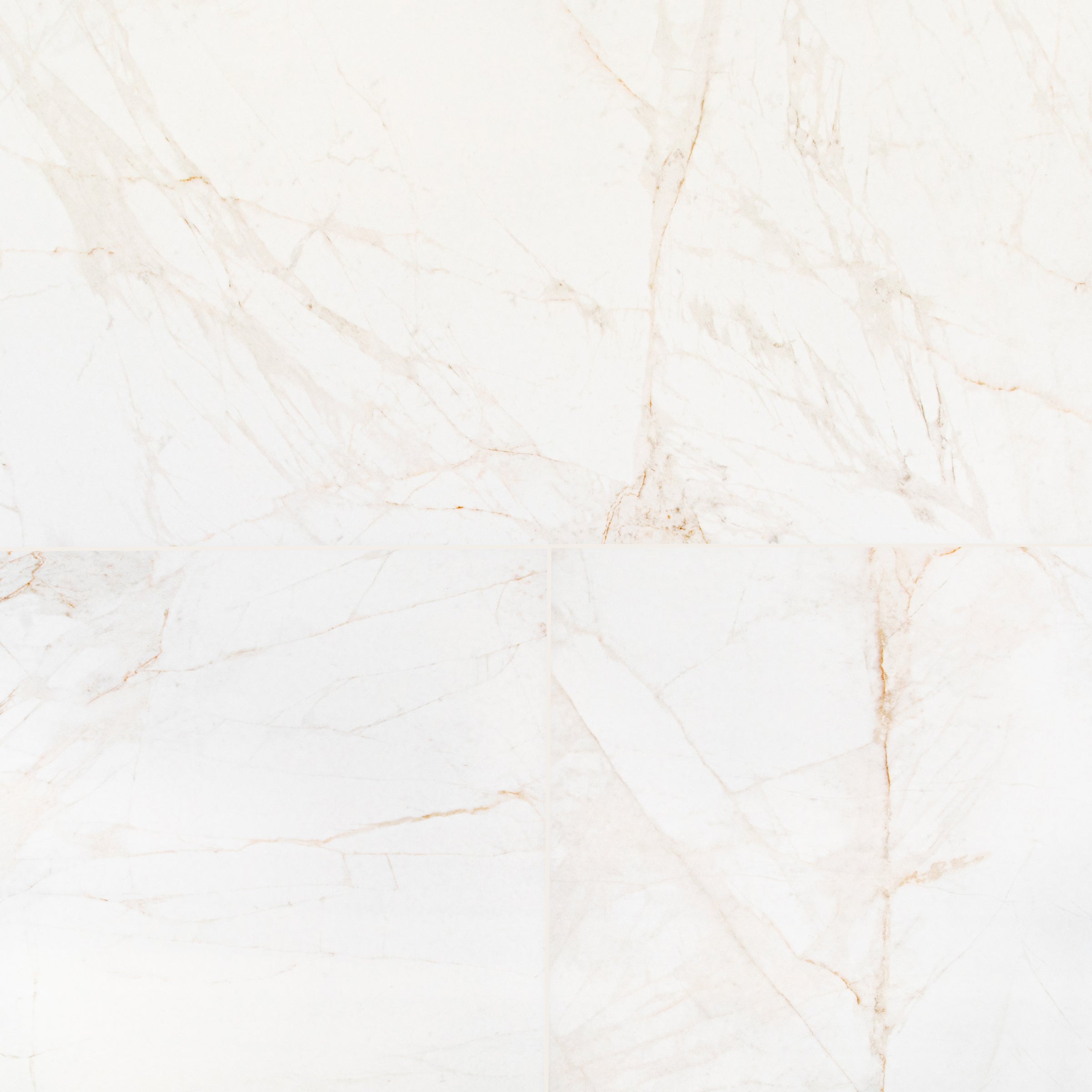 Spider Gold Matte Marble Look Porcelain Tile with delicate gold and beige veining on white in Large Format Tiles at Reno Source