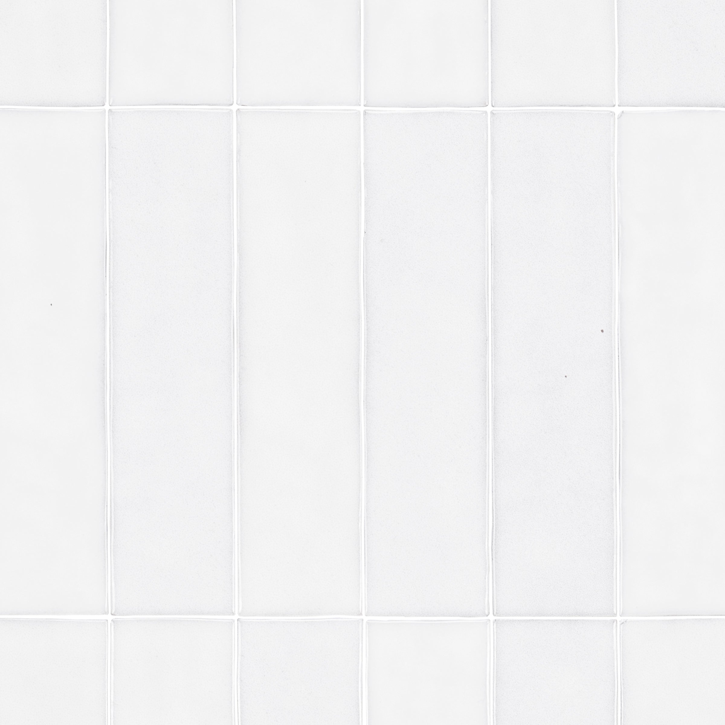 White Glossy Ceramic Tile in 2x8 format with handcrafted style from Small Format Tiles and Zel Glazed Ceramic Tiles collections