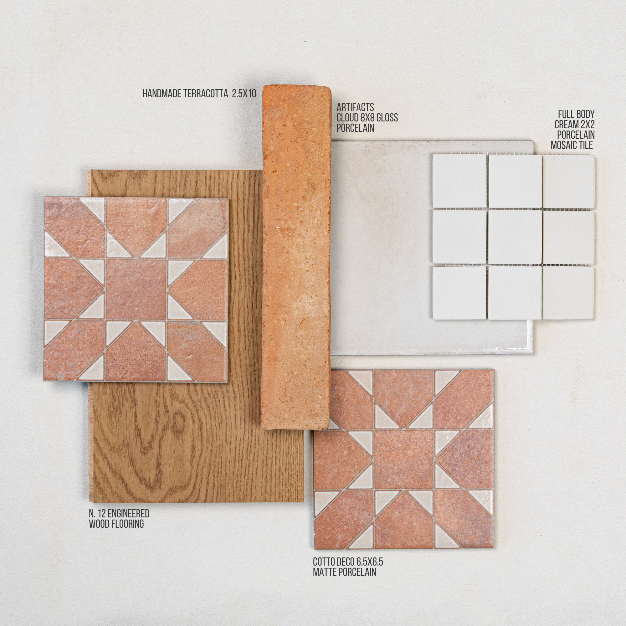 Flat lay of terracotta patterned ceramic tiles, wood-look engineered flooring, and cream porcelain mosaic tiles on pale background