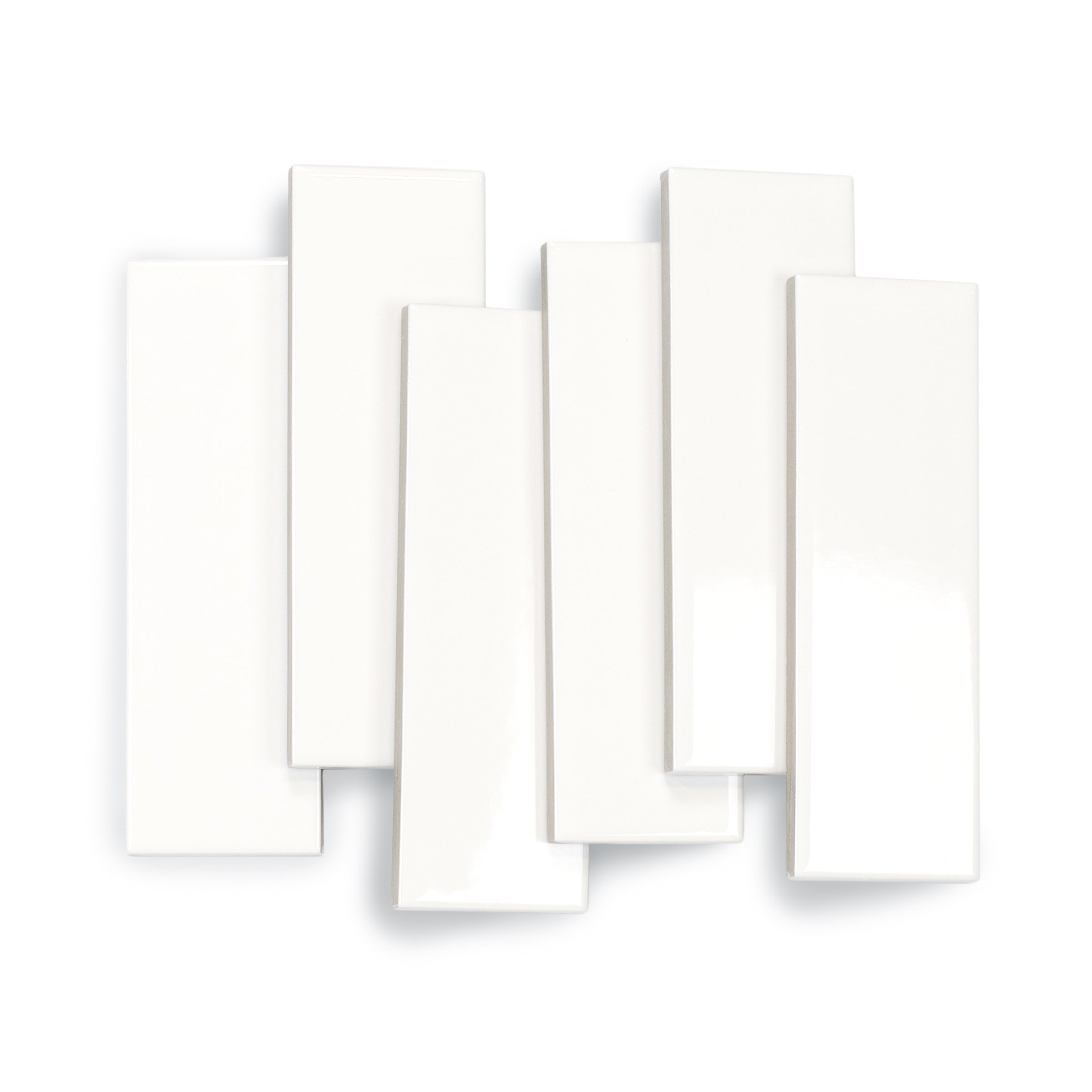 Glossy slim white porcelain tiles with smooth surface and sharp edges arranged in a staggered layout on white background