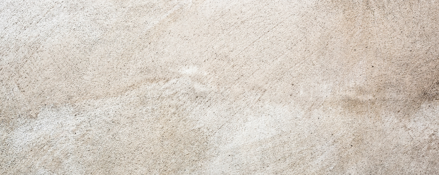 Beige textured stone surface with subtle variations in color
