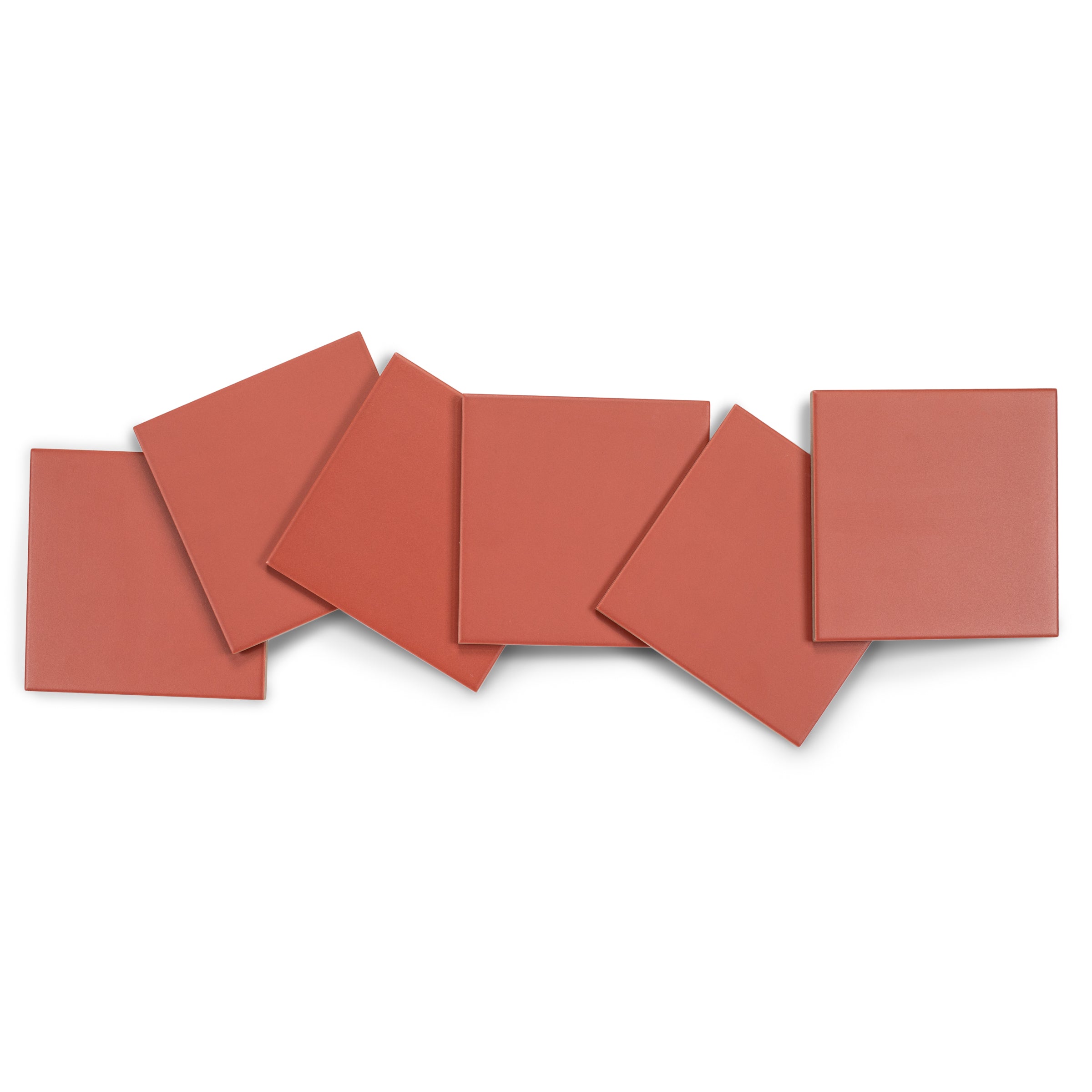 Six red terracotta square tiles arranged in a staggered, overlapping pattern on a white background