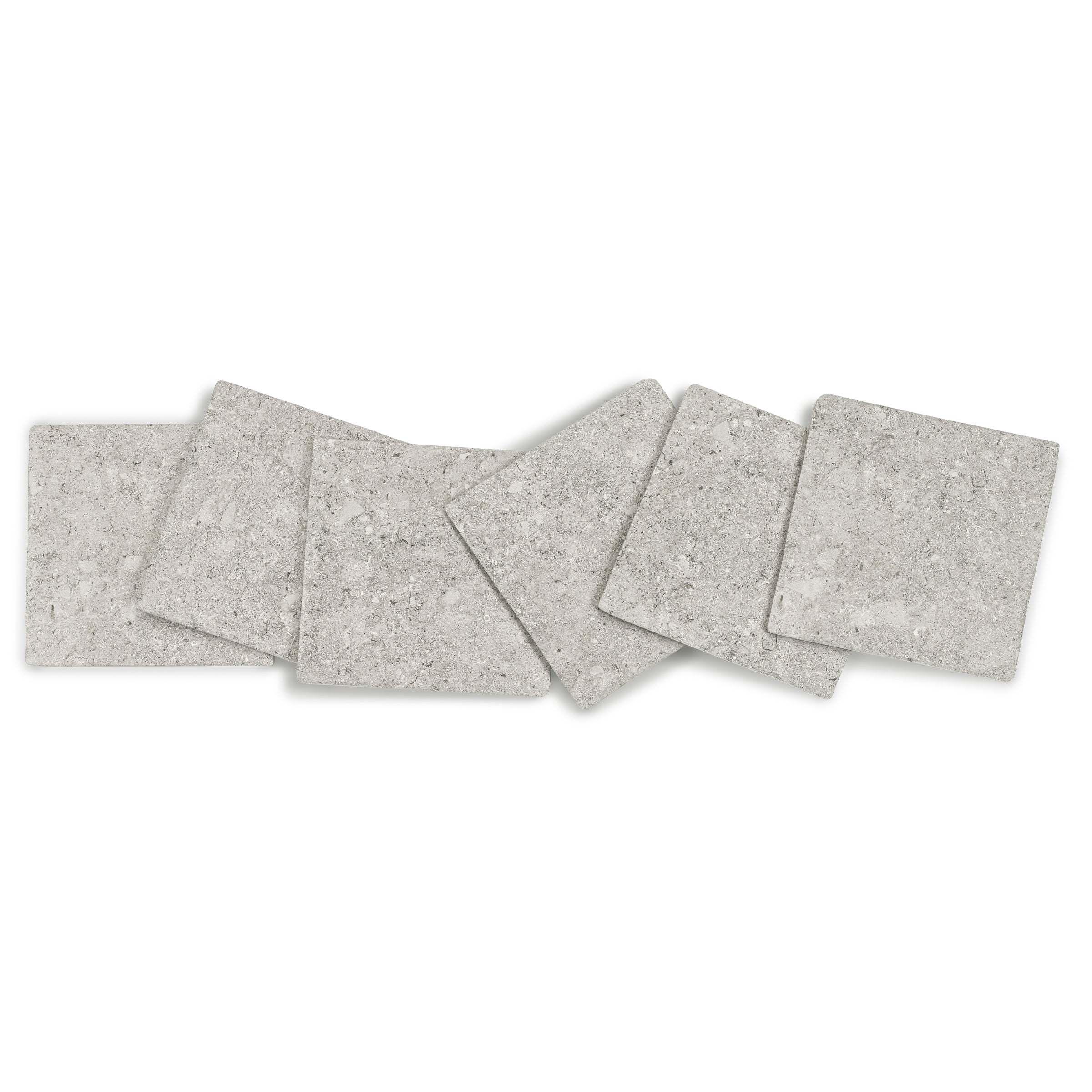 Light grey square porcelain tiles with subtle stone texture arranged in a casual overlapping layout