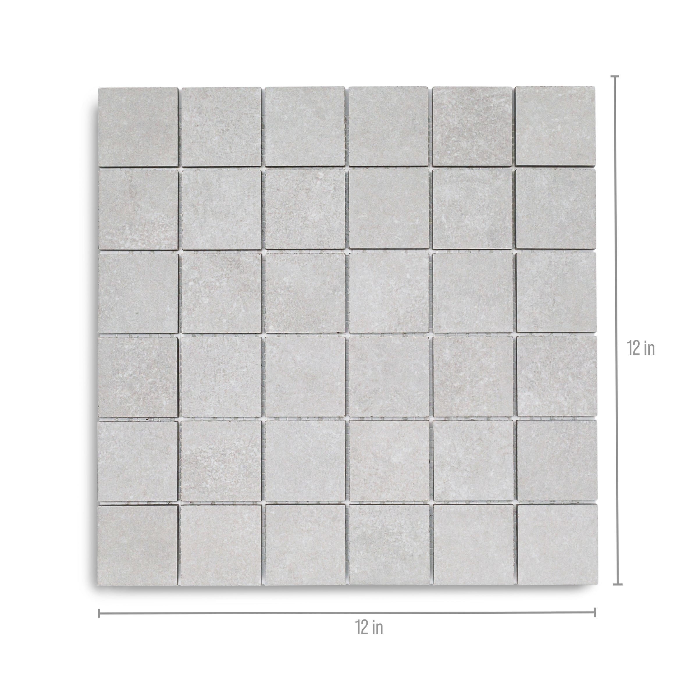 Grid of ash-gray porcelain mosaic tiles with a cement-like texture and fine grout lines in a 12 by 12 inch panel