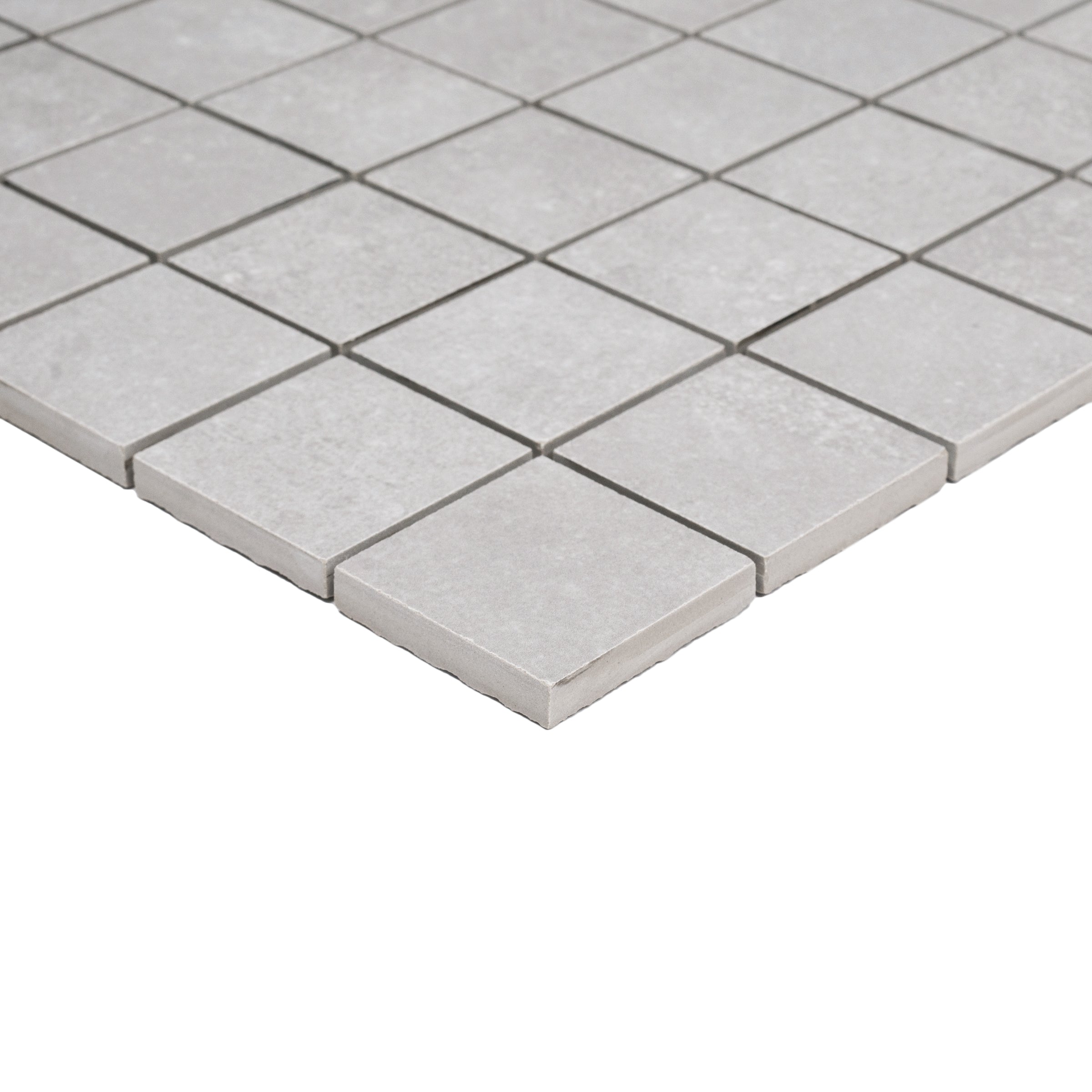 Ash 2x2 Cement Look Porcelain Mosaic Sample showcasing porcelain tiles from the Large Format Porcelain Mosaic collection