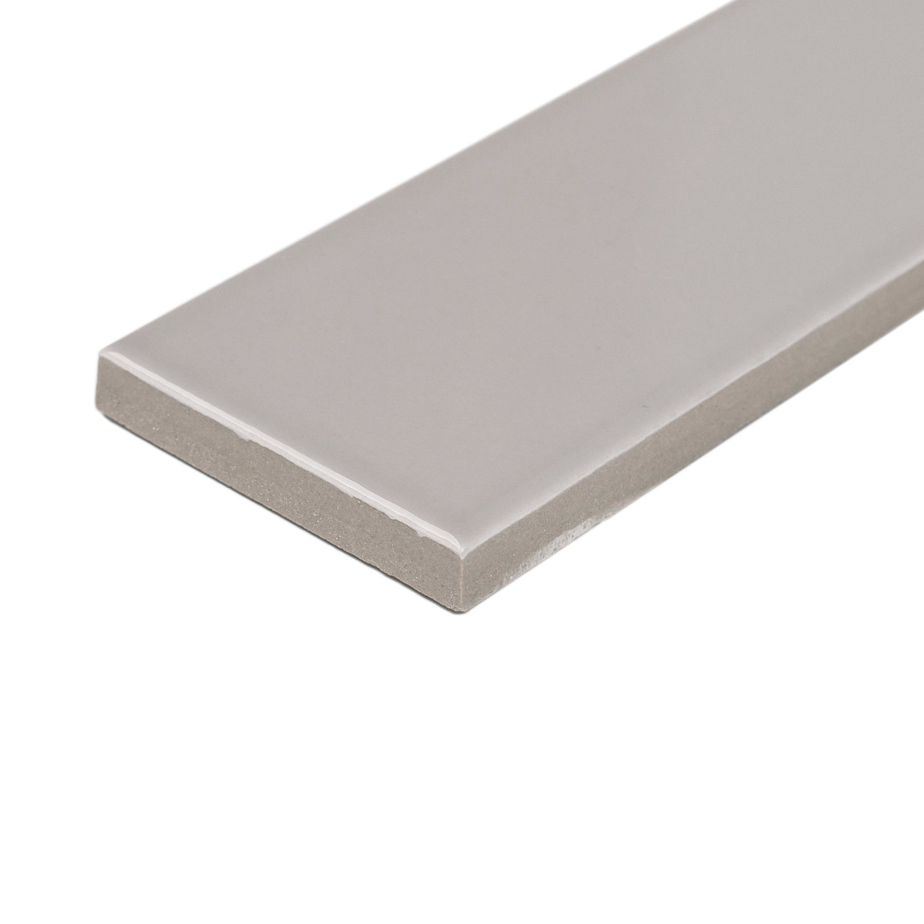 Glossy porcelain tile in soft ash gray with smooth surface and clean, sharp edges isolated on white background