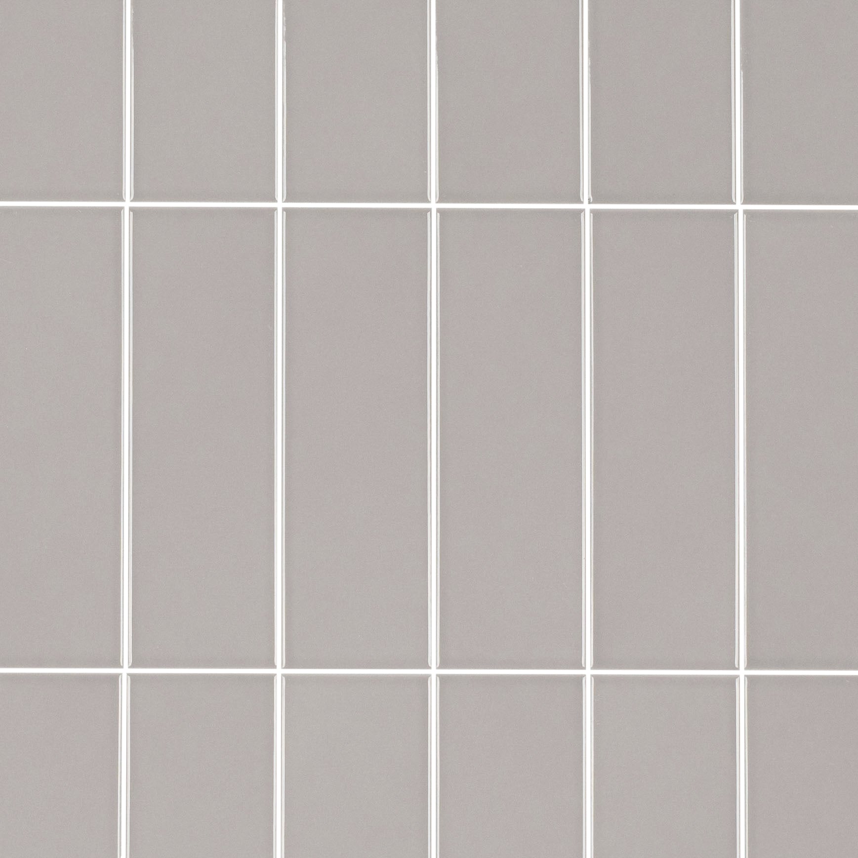 Colorblock Porcelain Tile in glossy ash gray with clean 2x6 grid from Small Format Tiles New Arrivals Porcelain collection