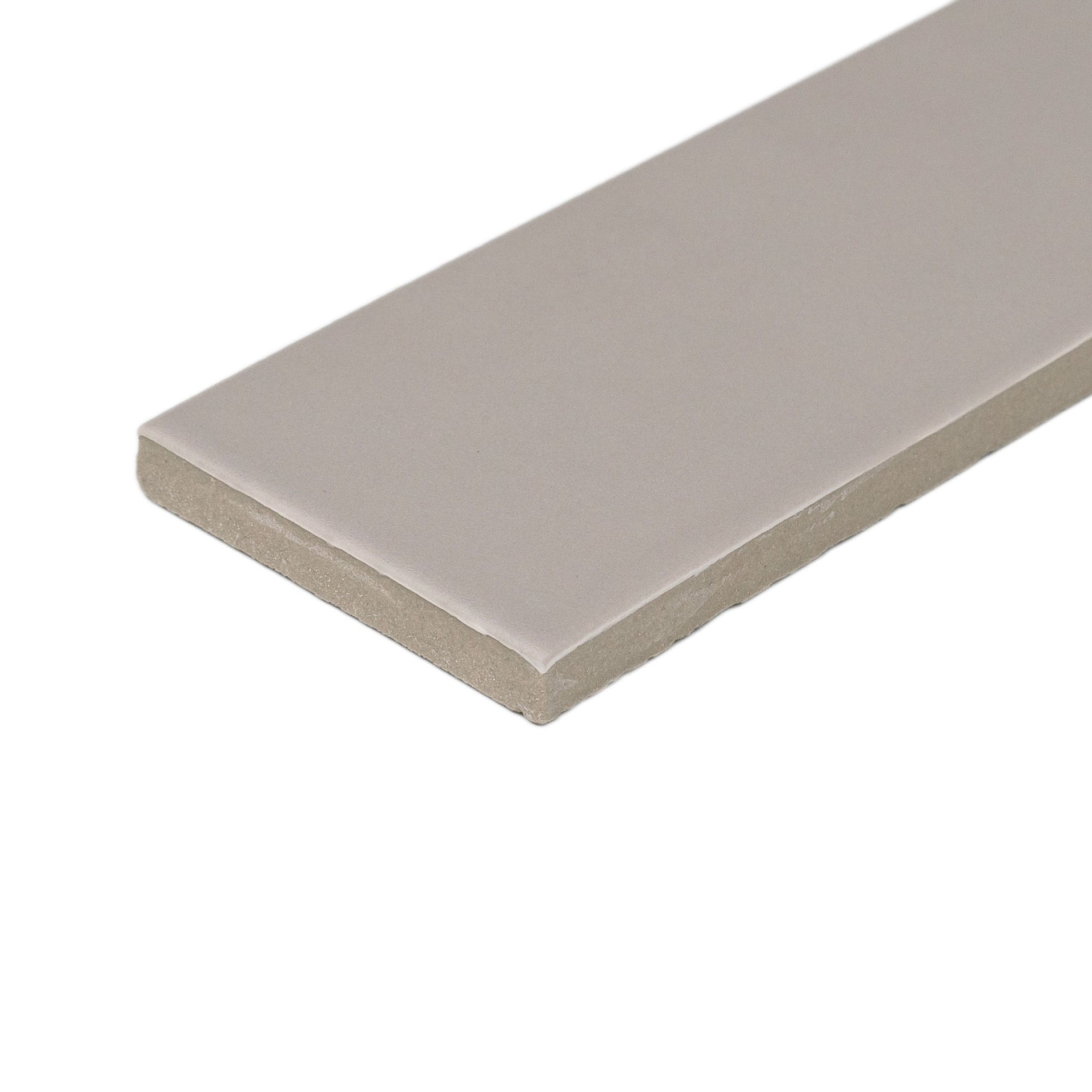 Rectangular porcelain tile in soft muted ash tone with matte finish and smooth, clean-cut edges isolated on white background